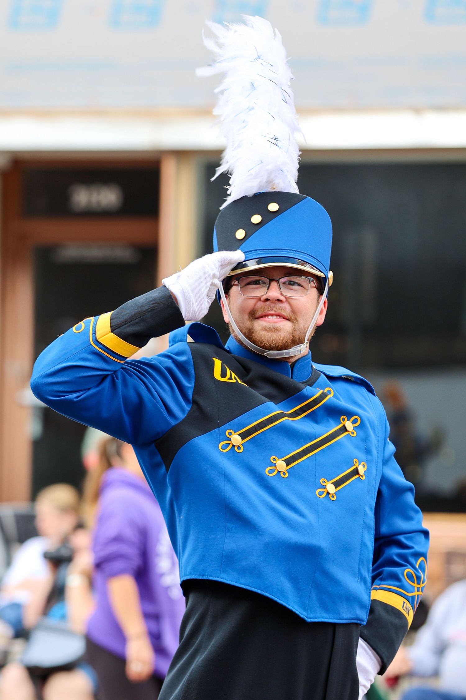 UNK Drum Major saluting during Kearney Parade