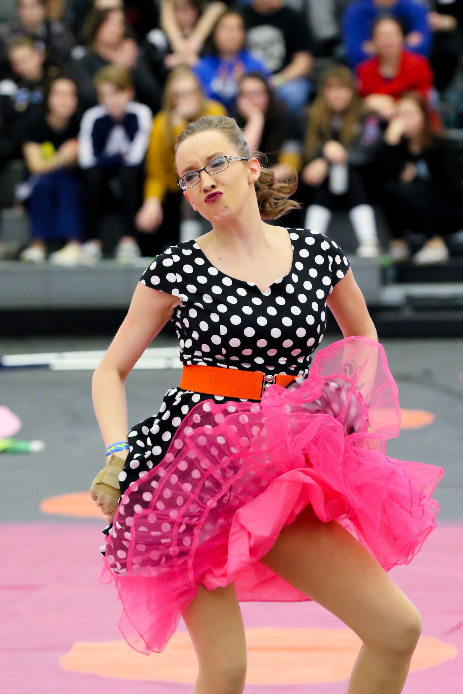 color guard performer dancing with sass during WGI Denver