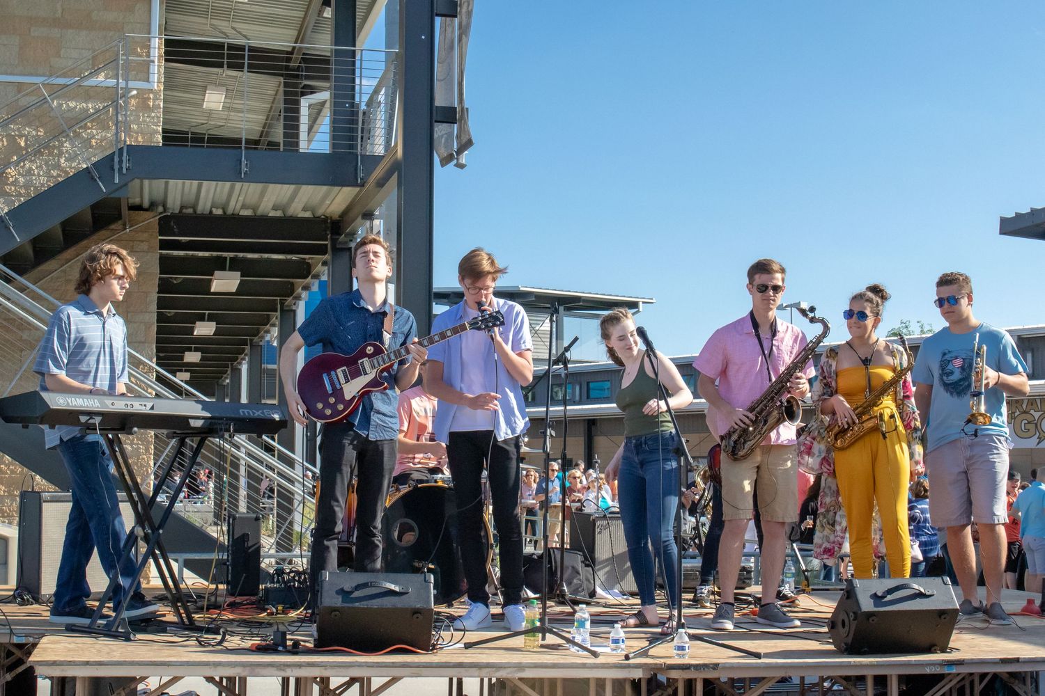 Live concert shot during hops for harmony highlighting atmosphere and stage energy