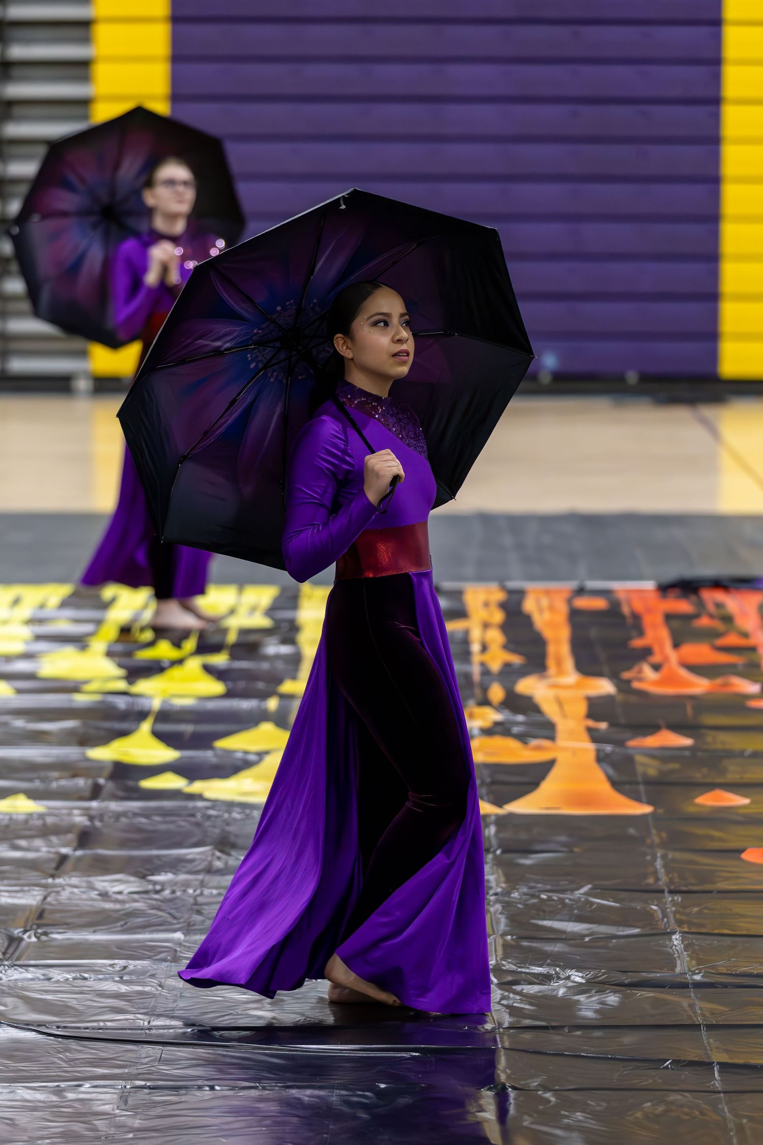 Columbus hs color guard member performing during heartland winter arts association (HWAA) competition
