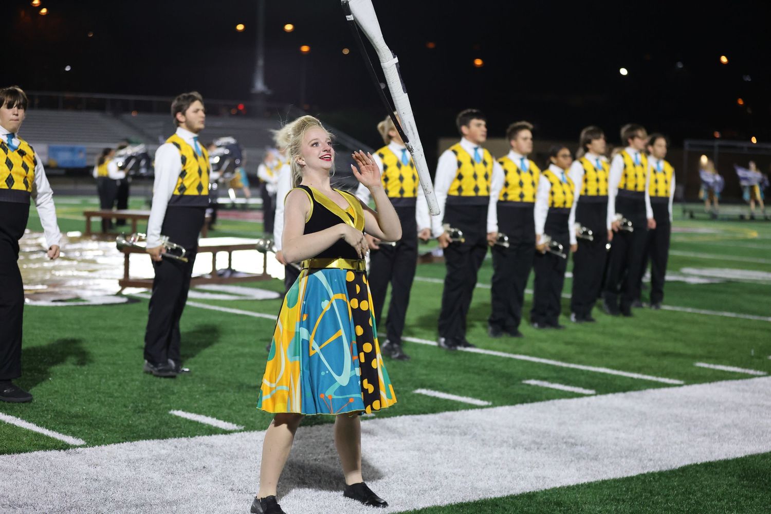Bellevue East HS color guard member performing during Bellevue Band Festival