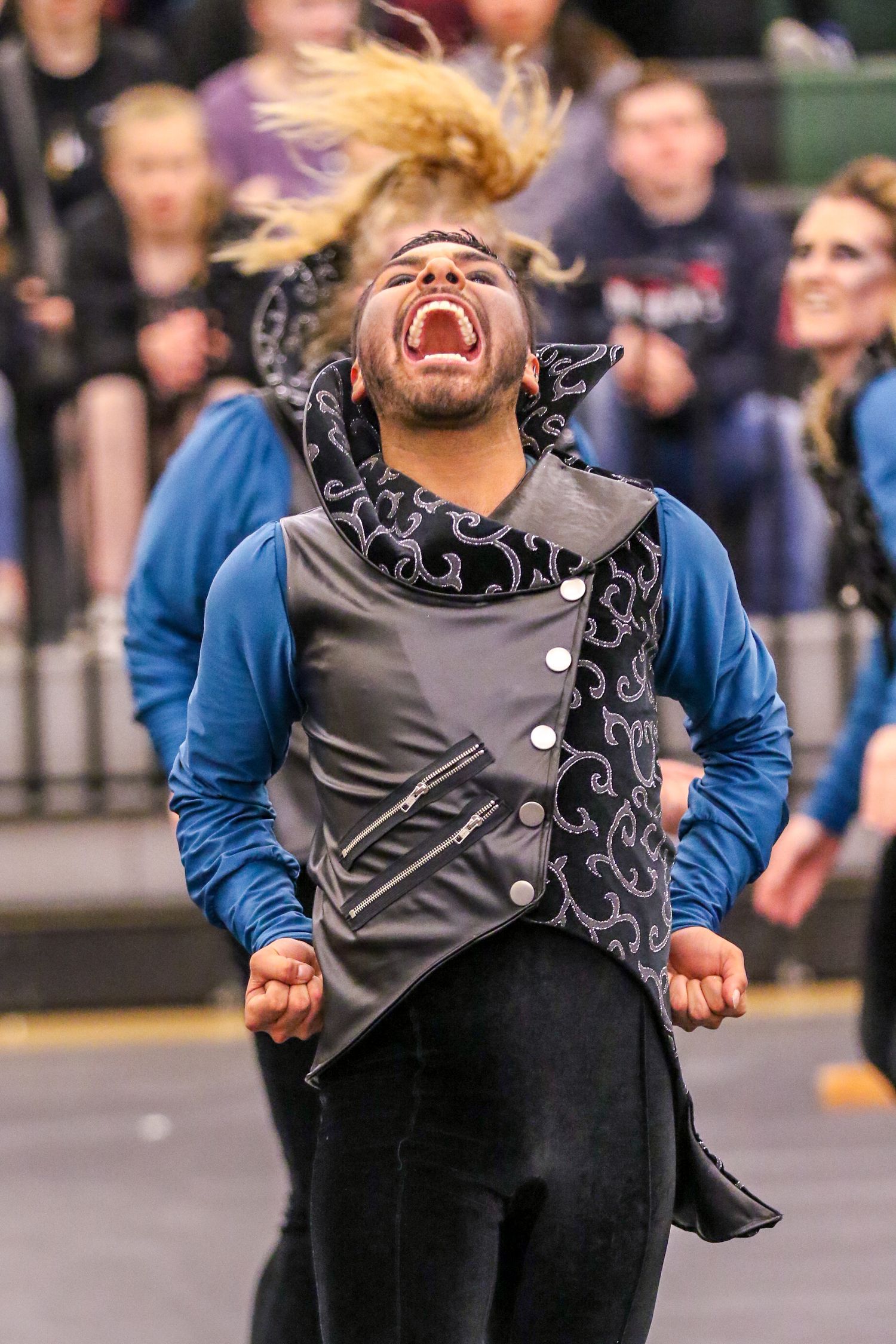 Malachi color guard performer showing fierce face during WGI Denver