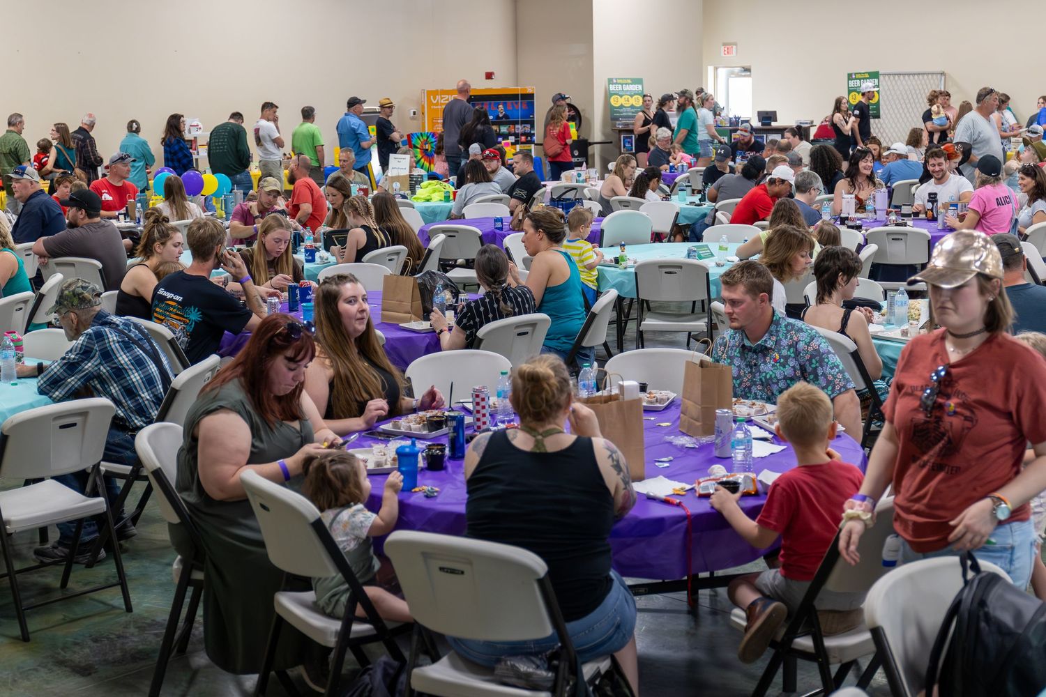 people enjoying food during smoke your butt off bbq