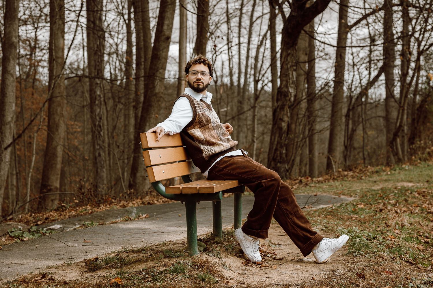 Candid moments captured on a woodland path showing playful interaction and movement.