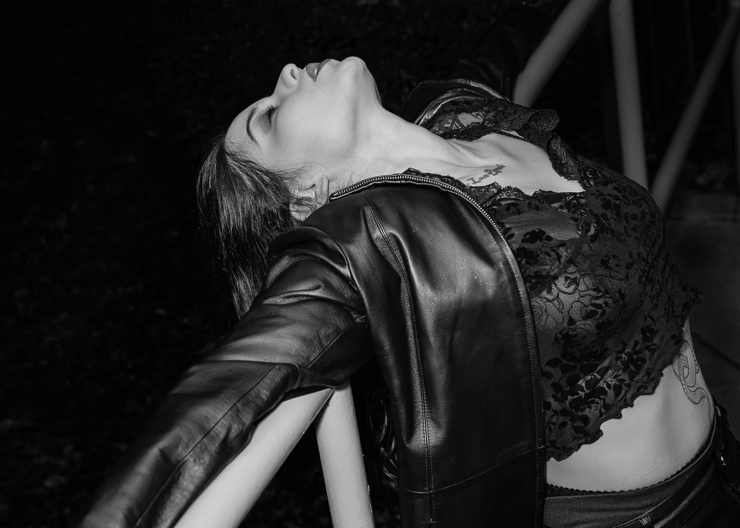 Black and white artistic dance performance photos showing dramatic movement and poses.