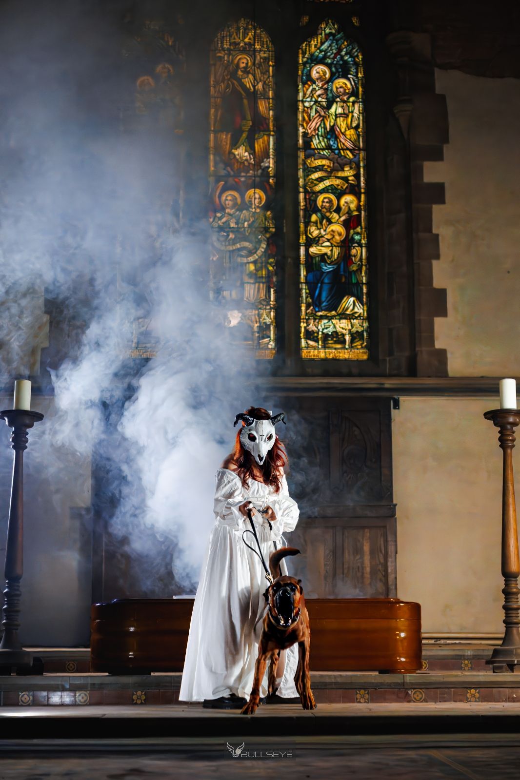 Atmospheric gothic church scene with smoke effects and stained glass windows featuring Doberman.