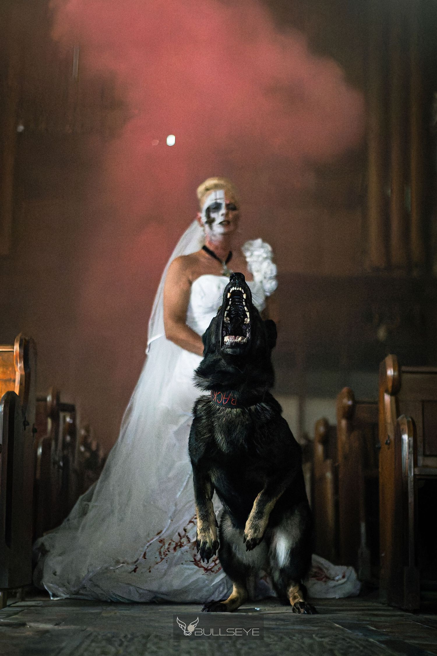 Artistic photo series showing a dramatic performance with smoke effects and contrasting black and white costumes.