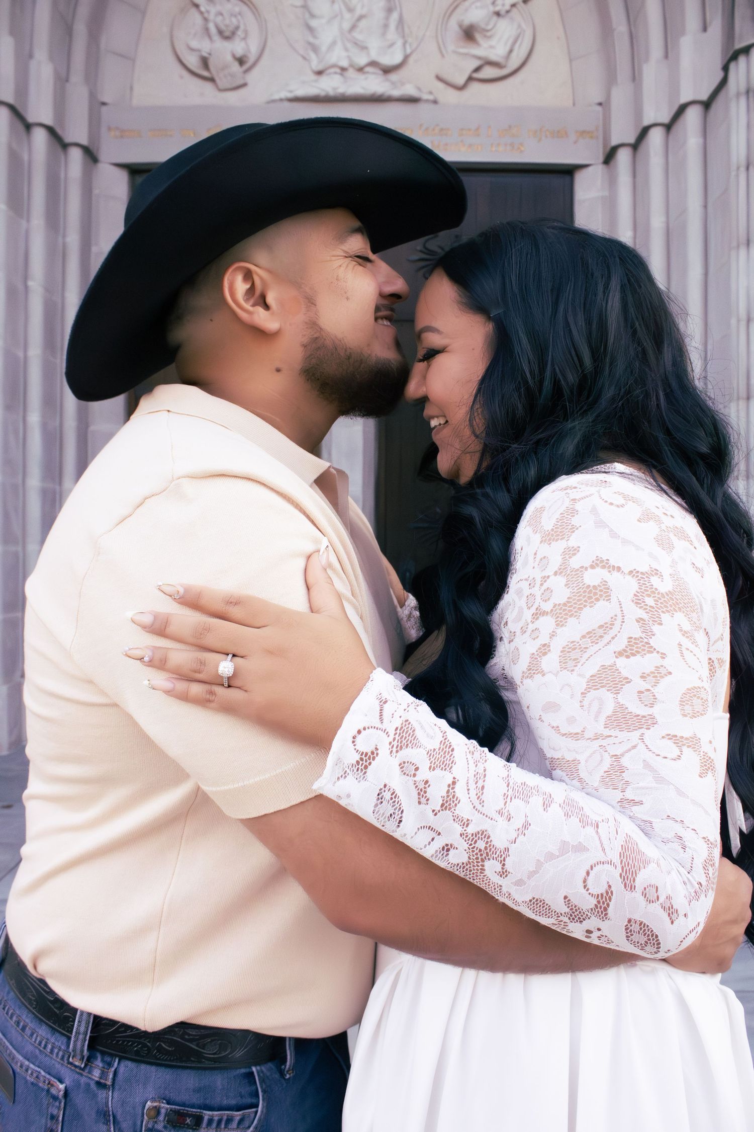 A romantic couple in western attire sharing tender moments against a white backdrop in a photo series.