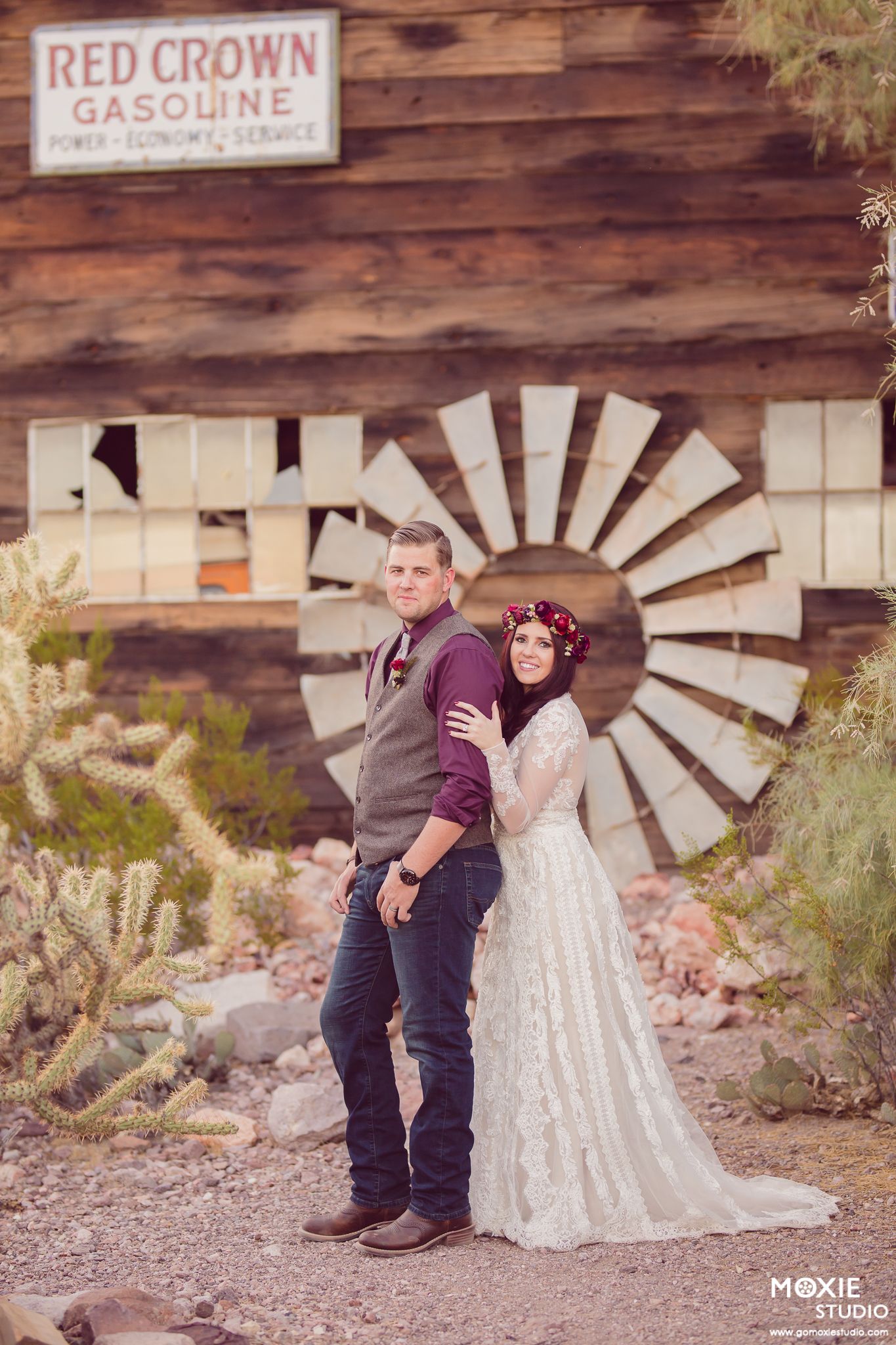 A romantic wedding photo sequence against a rustic wooden wall with a vintage Red Crown Gasoline sign and windmill.