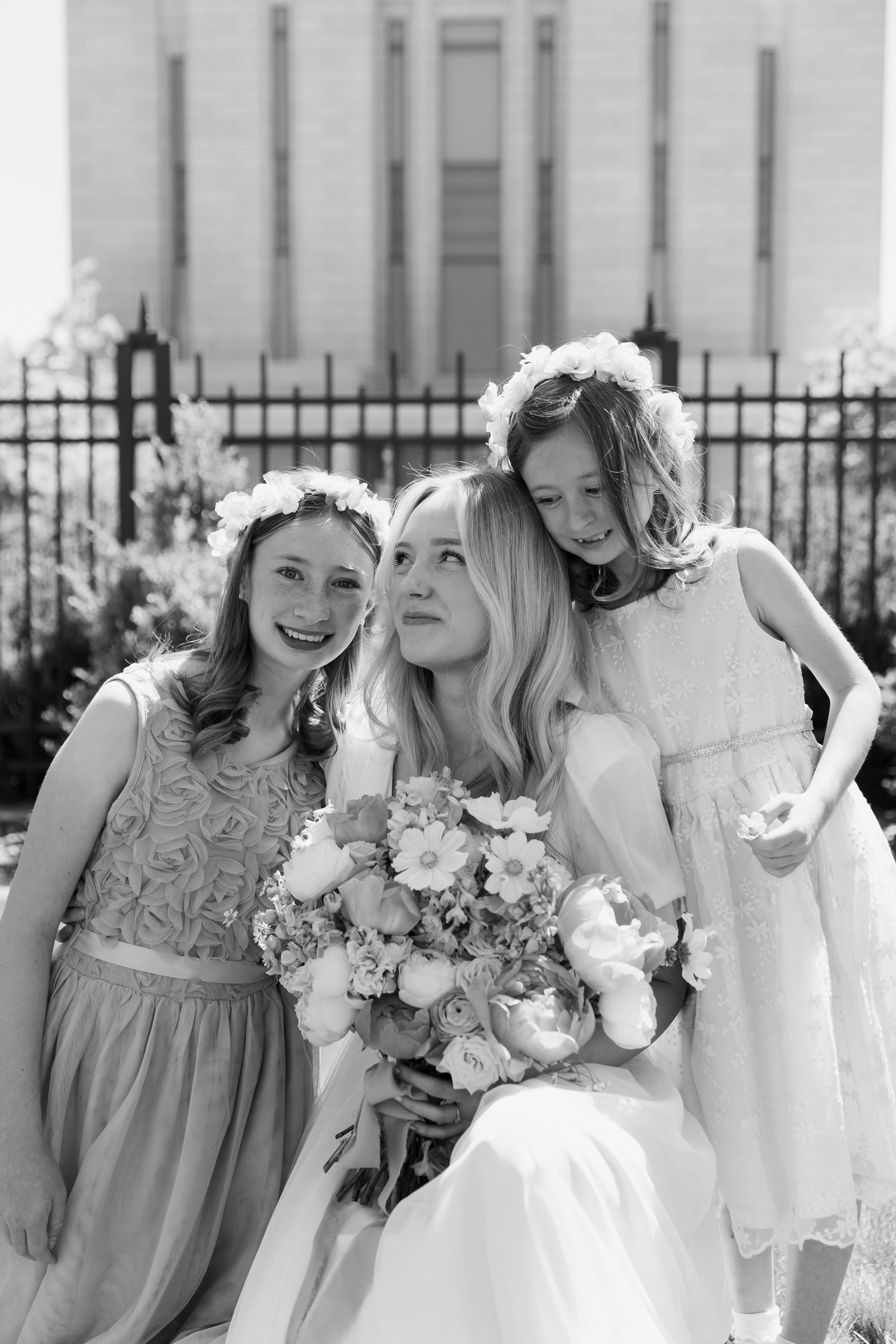 Bride with flower girl's using List of Pictures for wedding day