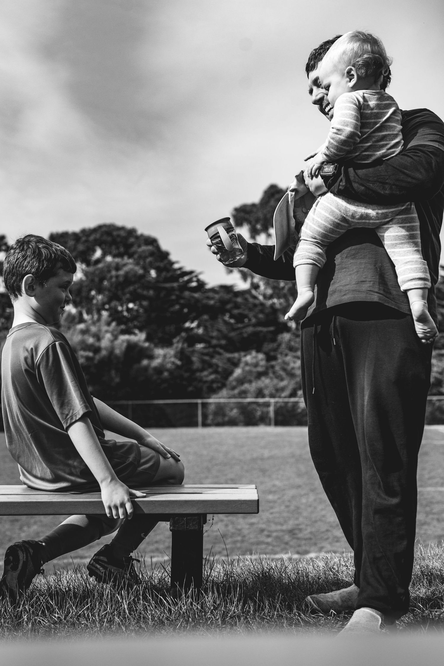 Sweet family moment between father and son from a Hobart family photographer