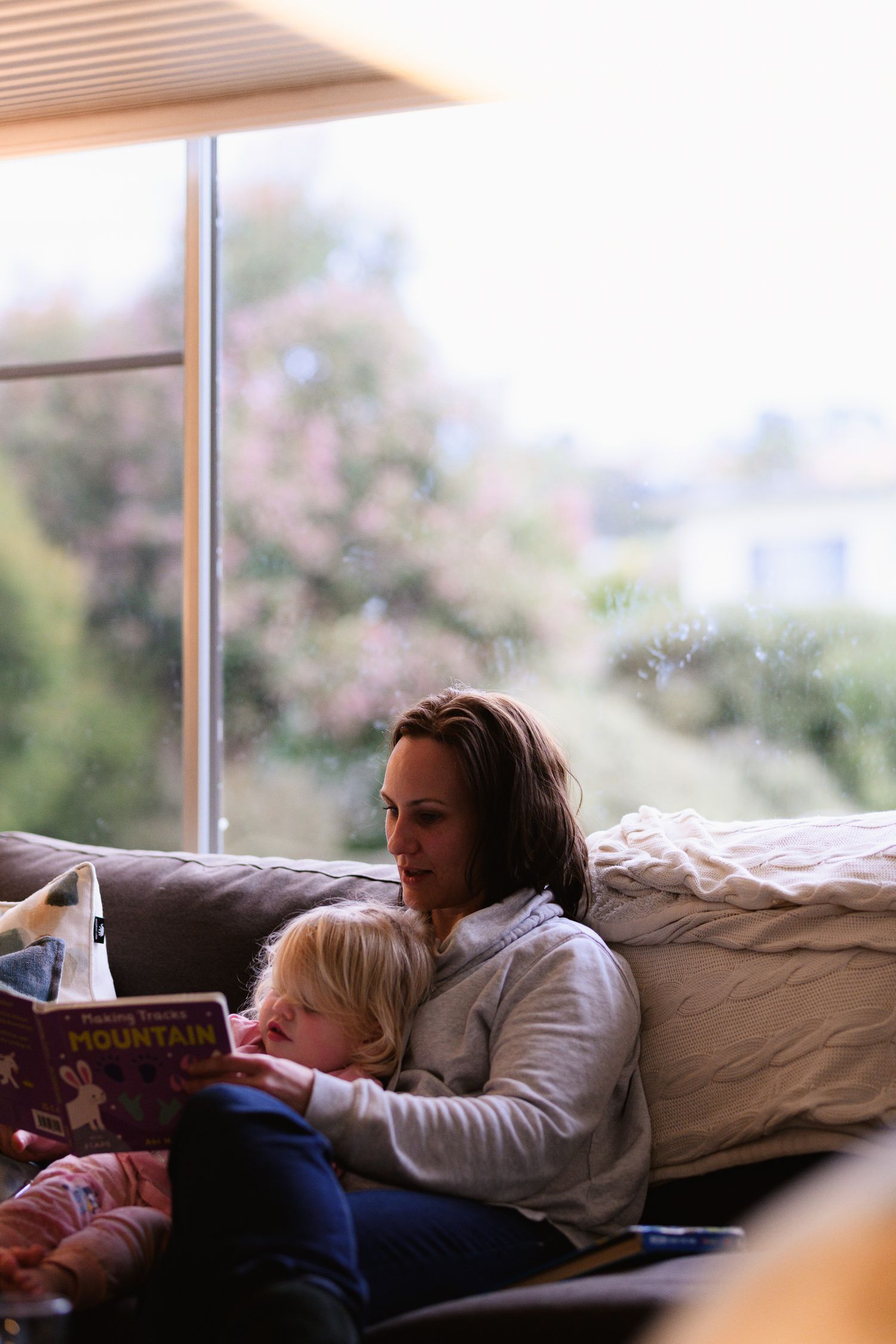 A beautiful shared moment with mother and daughter evocatively captured in documentary family photography style