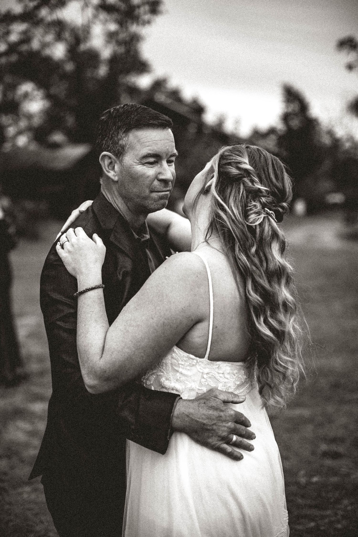 This couple enjoyed their wedding portraits during their first dance. Romantic, fun back yard wedding in Florida's beautiful fall weather.