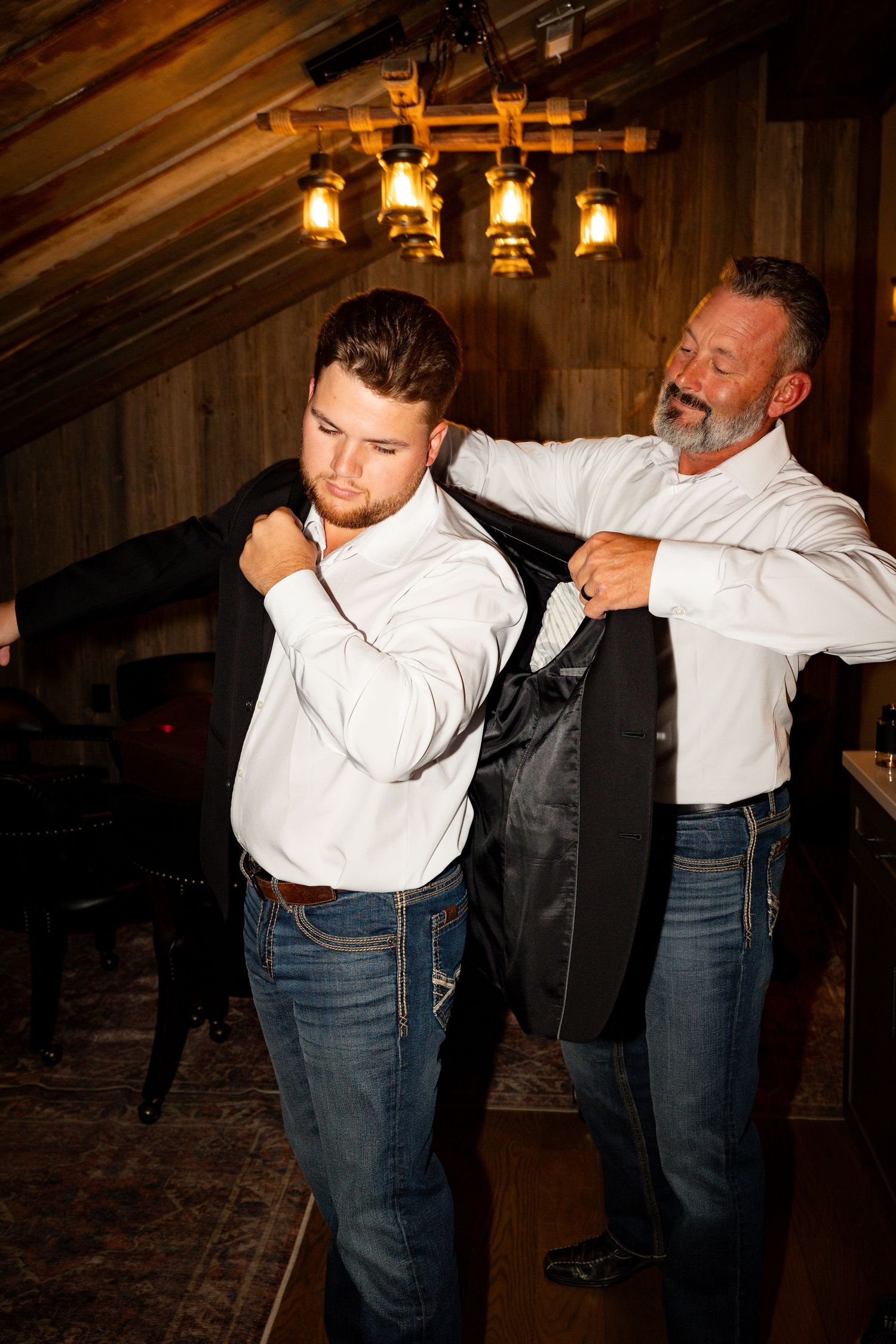A sequence of photos showing a staged western-style fight scene in a rustic wooden interior with lantern lighting.