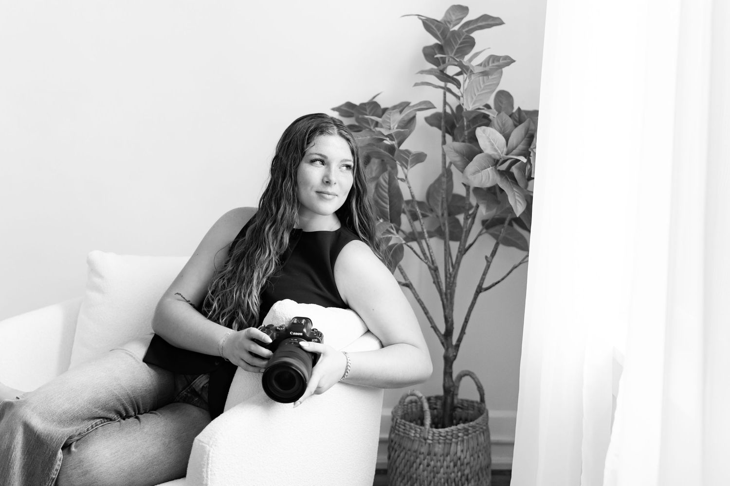 Black and white photo collage showing a person in various poses with a camera and plant against a white background.