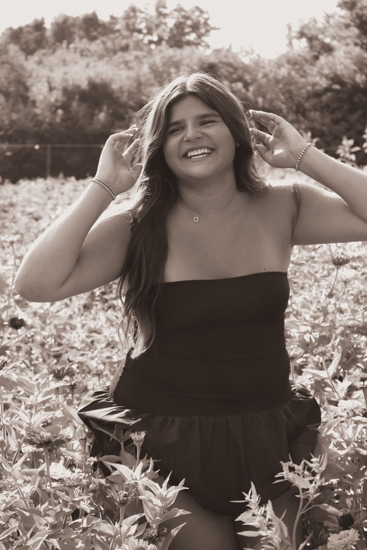 A sequence of joyful moments captured in a flower field with natural lighting and warm tones.