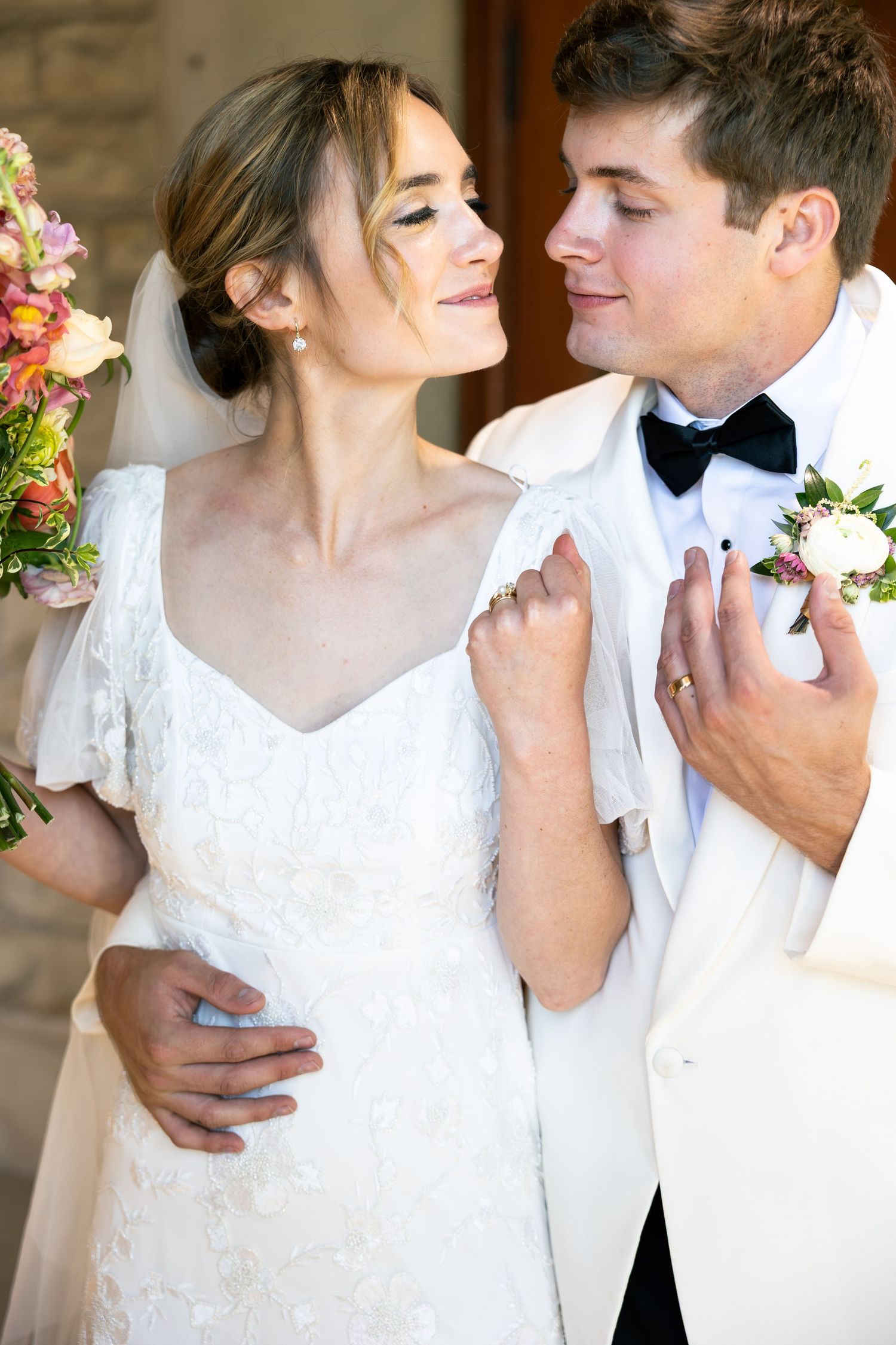 Romantic wedding portrait sequence in soft natural light.