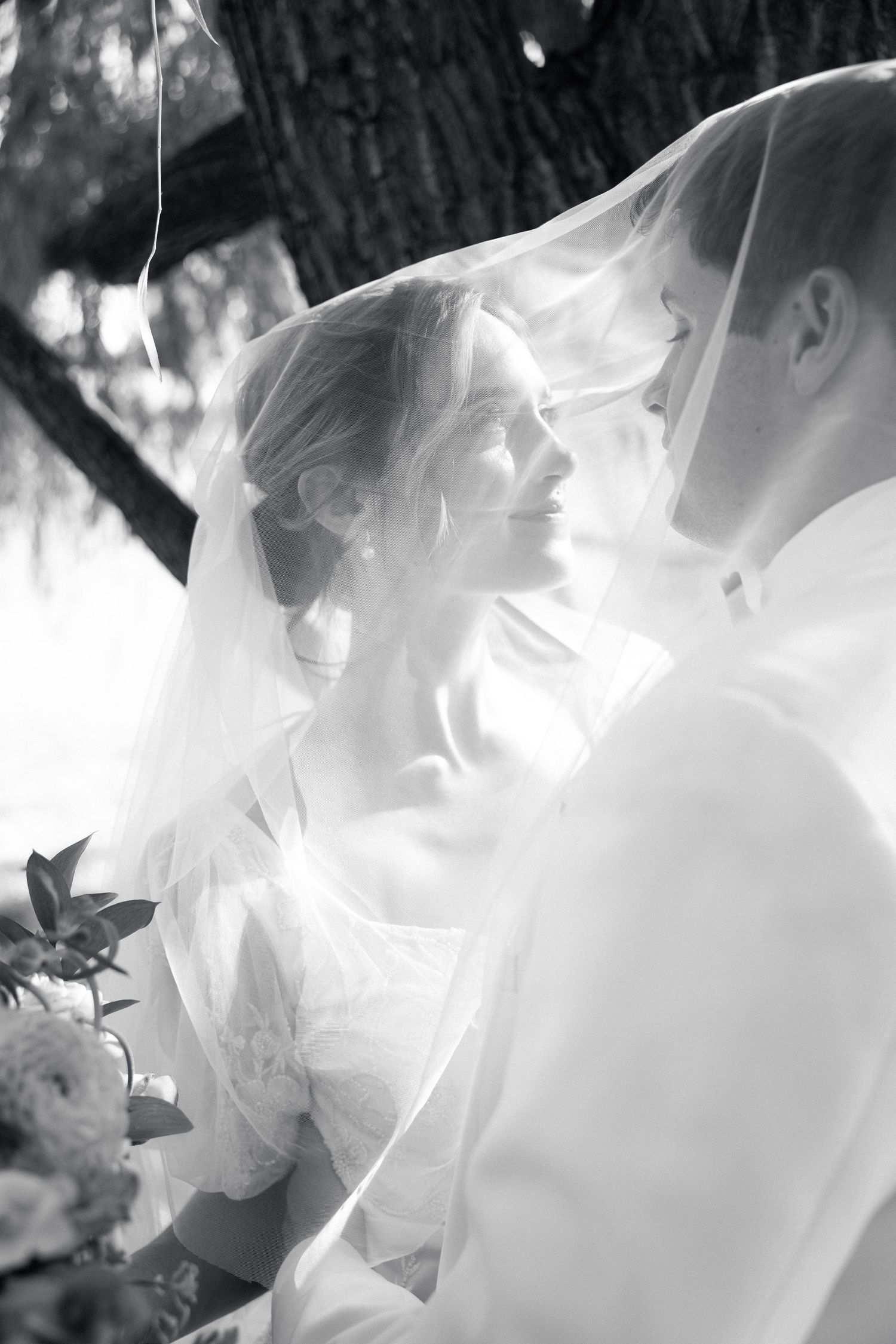 Ethereal white fabric flowing in soft light creating dreamy abstract patterns.