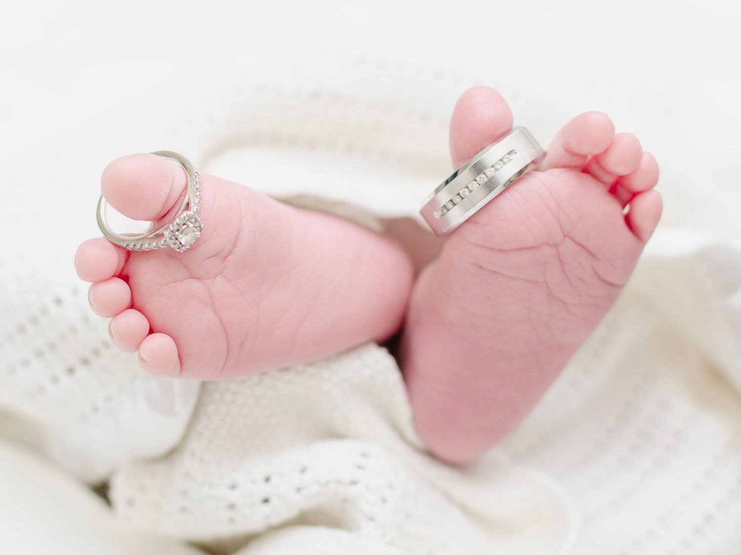Newborn baby sleeping on cream blanket, lifestyle newborn photography in Essex
