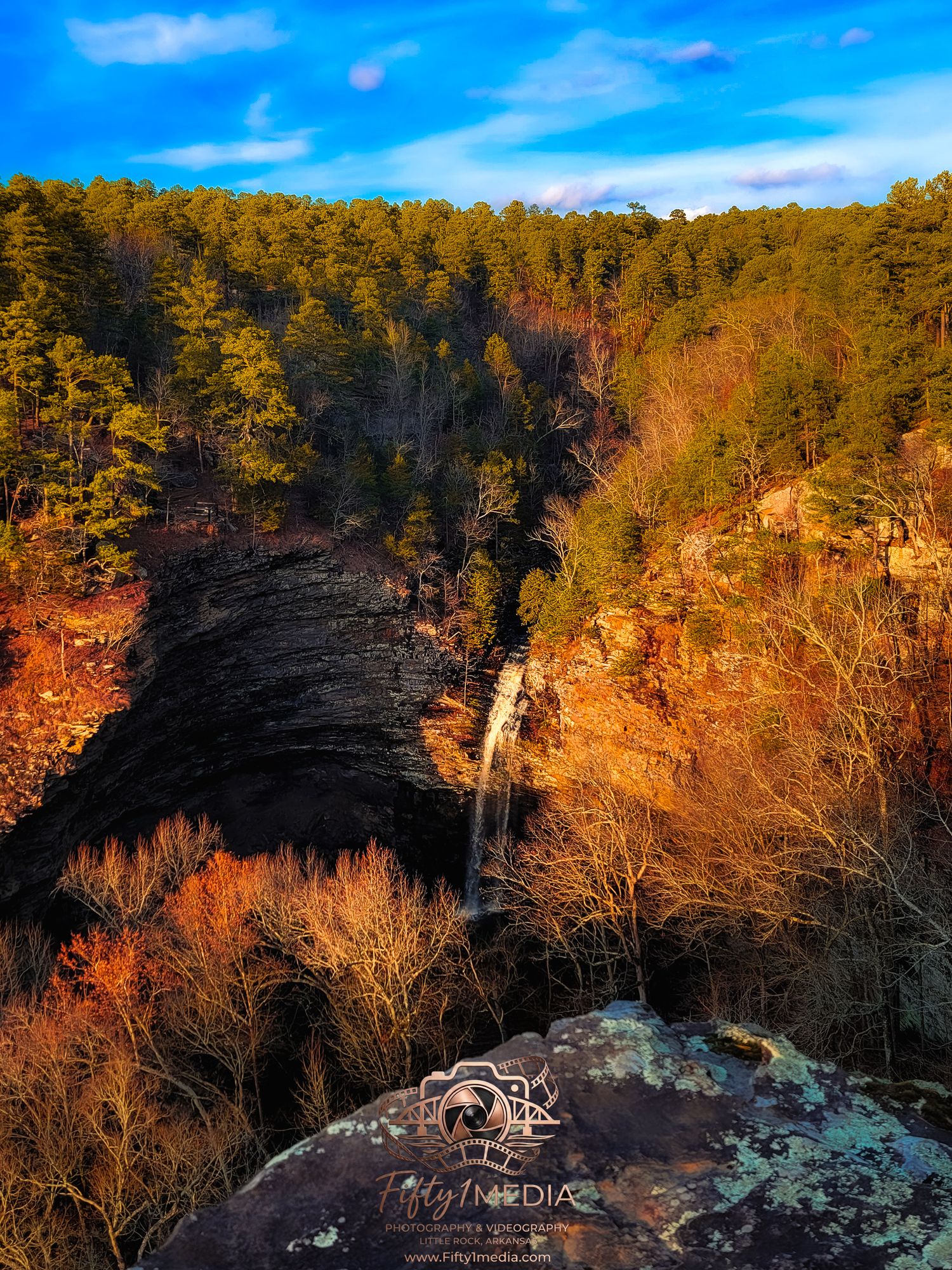 Vibrant sunset landscape photography over trees and rocks in Central Arkansas.