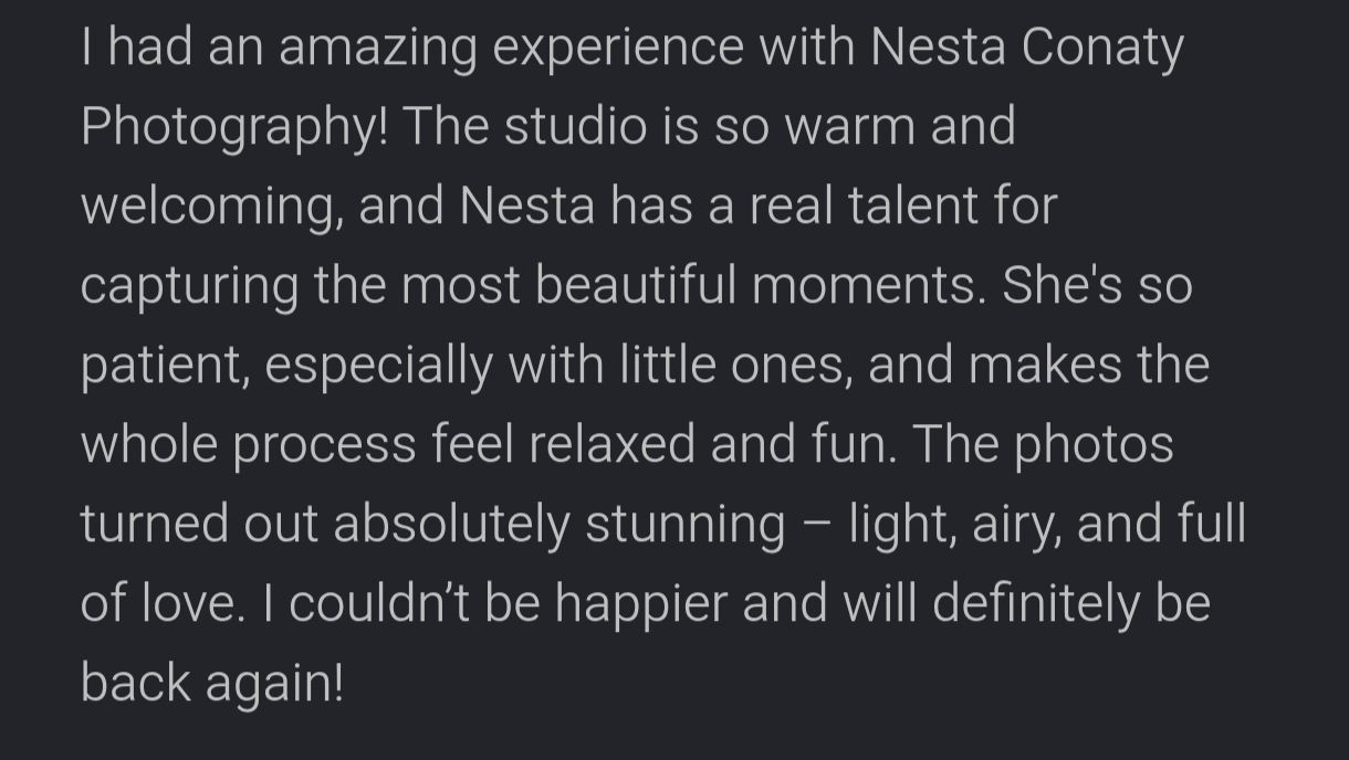 Five-star review praising Nesta Conaty Photography for warm studio, patience with children, and stunning light airy photos.