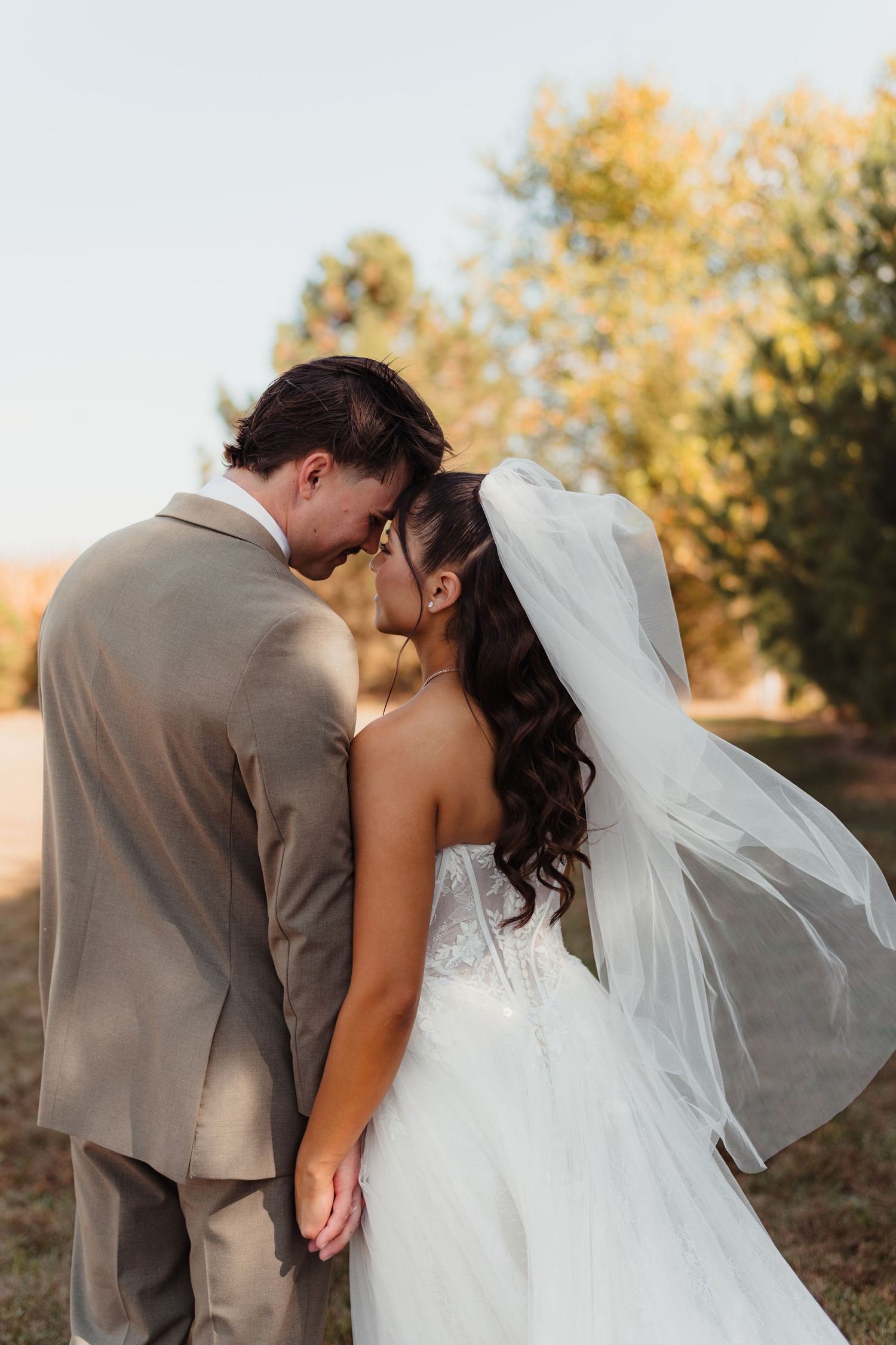 Bride and groom sharing an intimate moment for their elopement in Lafayette Indiana