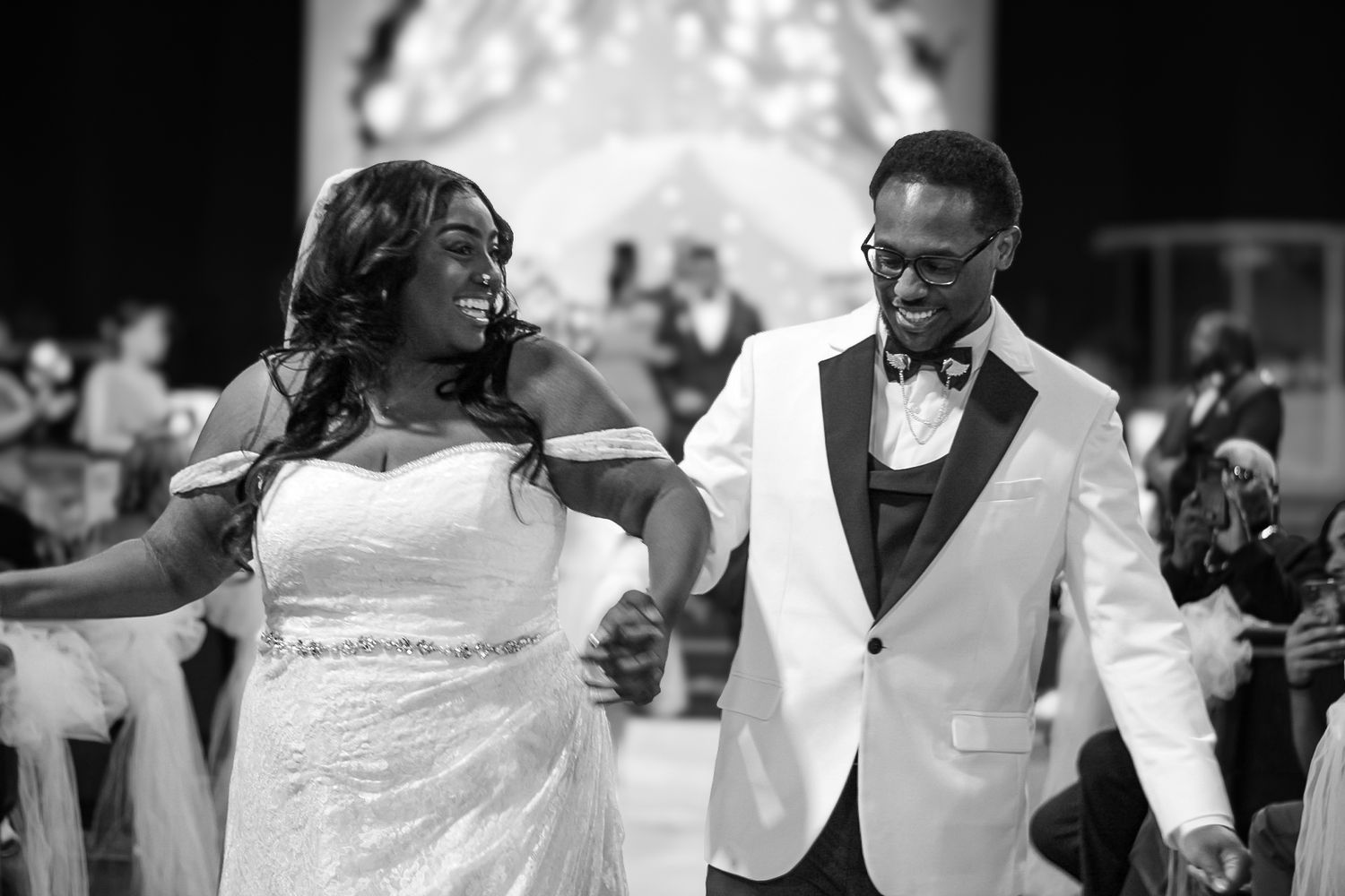 Wedding reception sequence showing couple dancing in traditional formal attire.