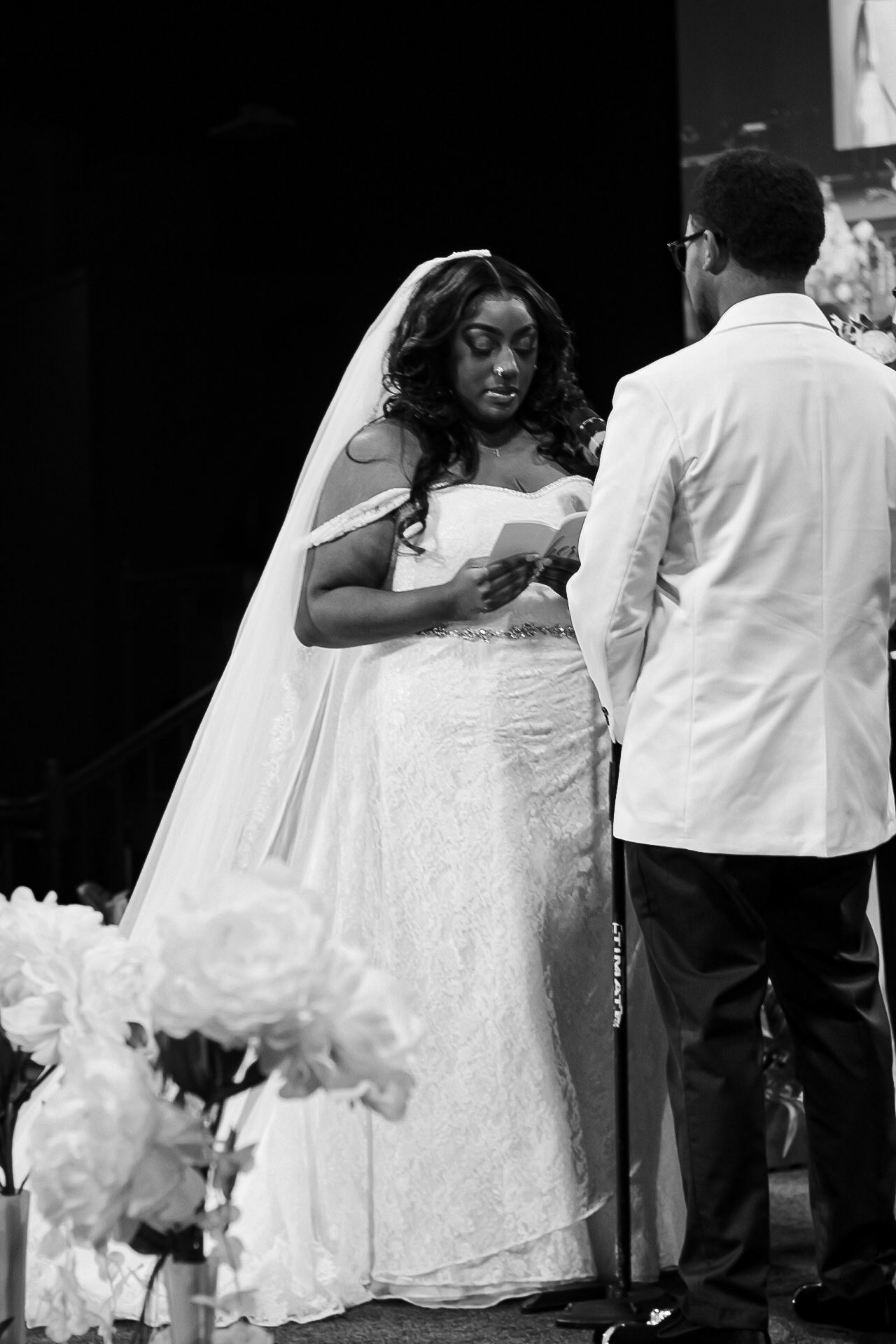 Black and white sequence of bride and groom during traditional wedding ceremony.