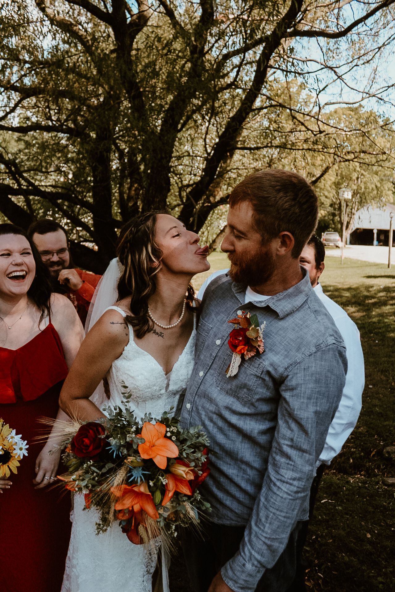 A joyful wedding couple shares candid laughing moments in a series of outdoor photos with autumn foliage.