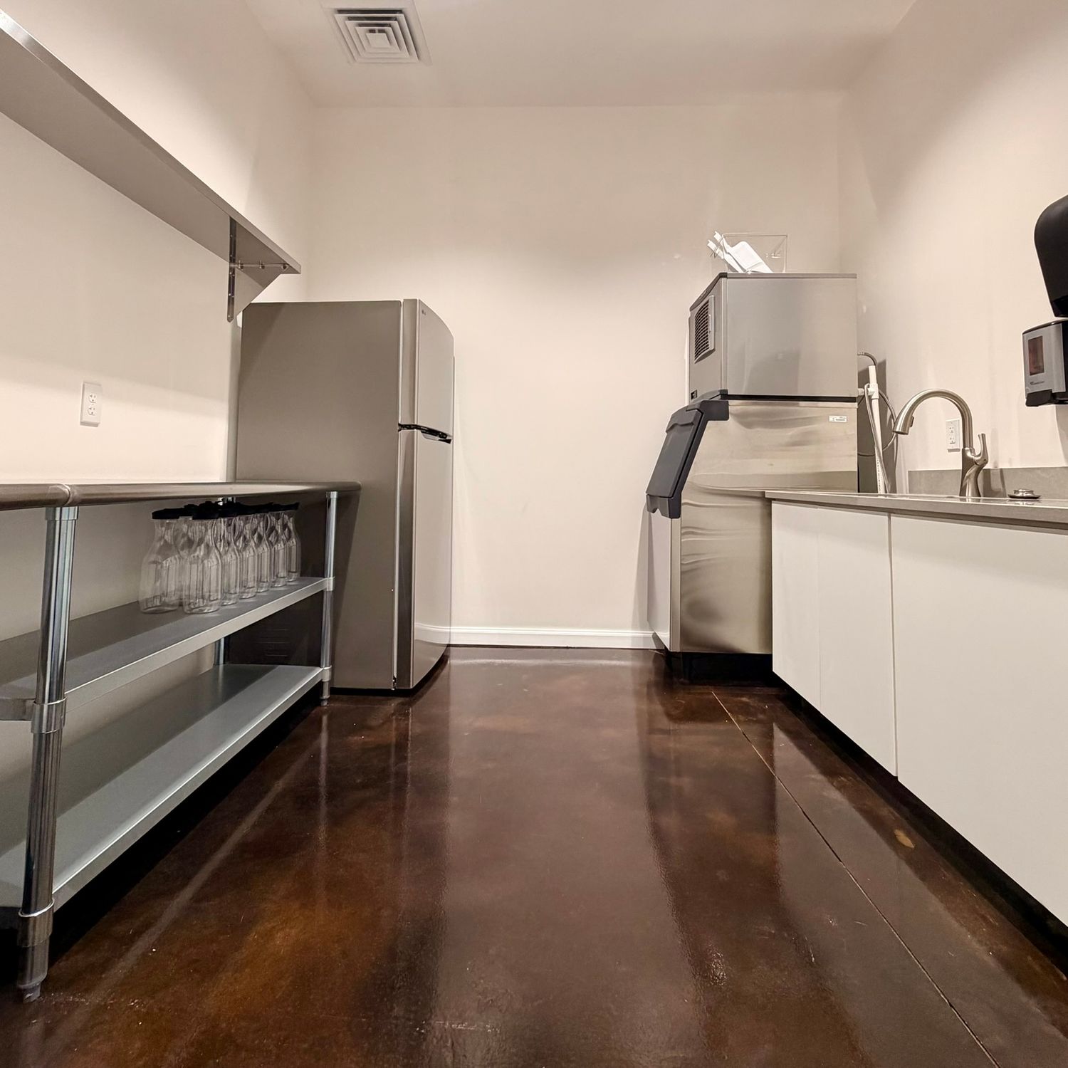 image of the prep kitchen at The Southern Chateau Wedding Venue in Payson, Utah County, Utah, and its full-sized fridge