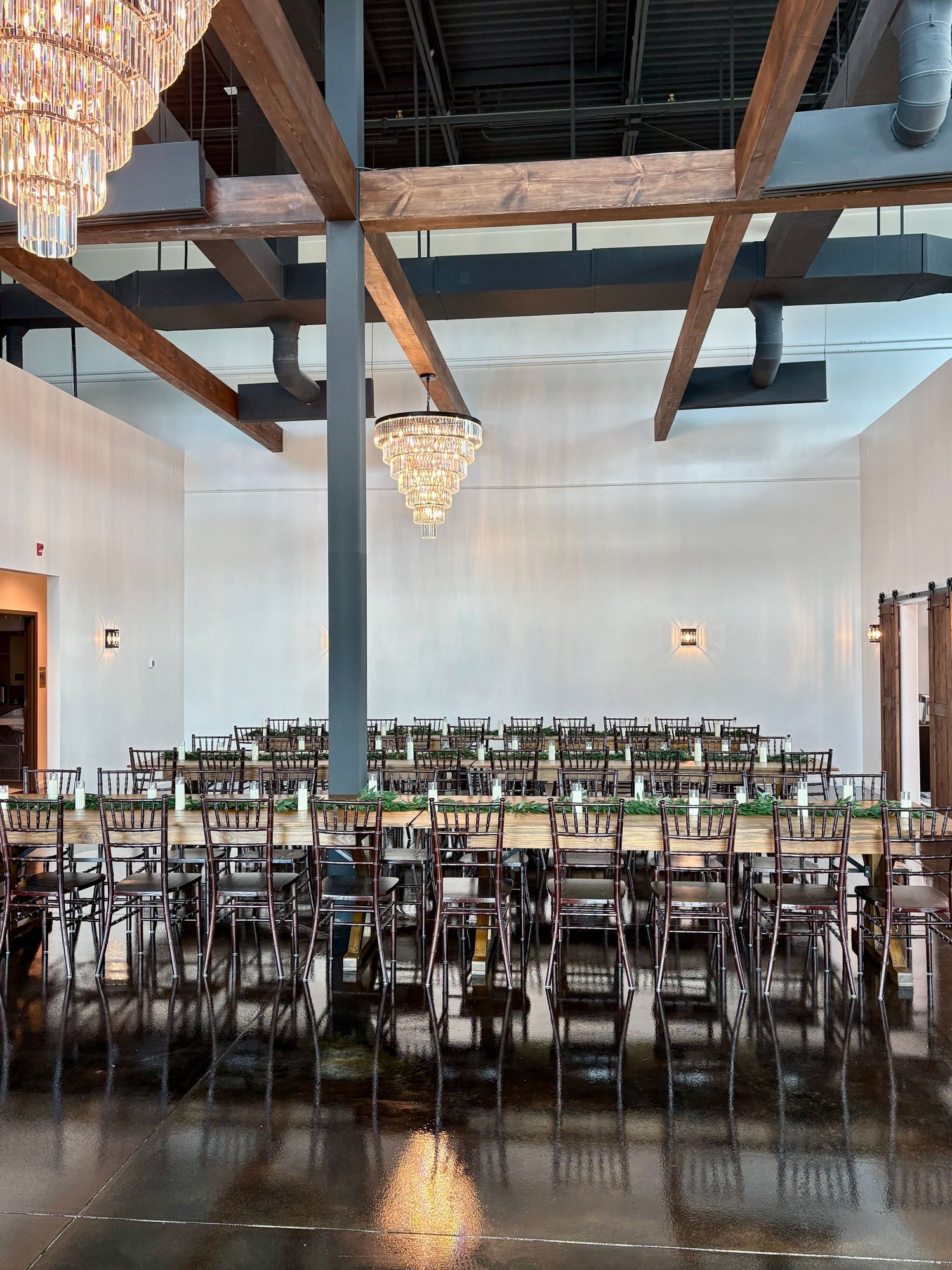 image of the event hall at The Southern Chateau Wedding Venue in Payson, Utah County, Utah, and its beautiful exposed wooden beams