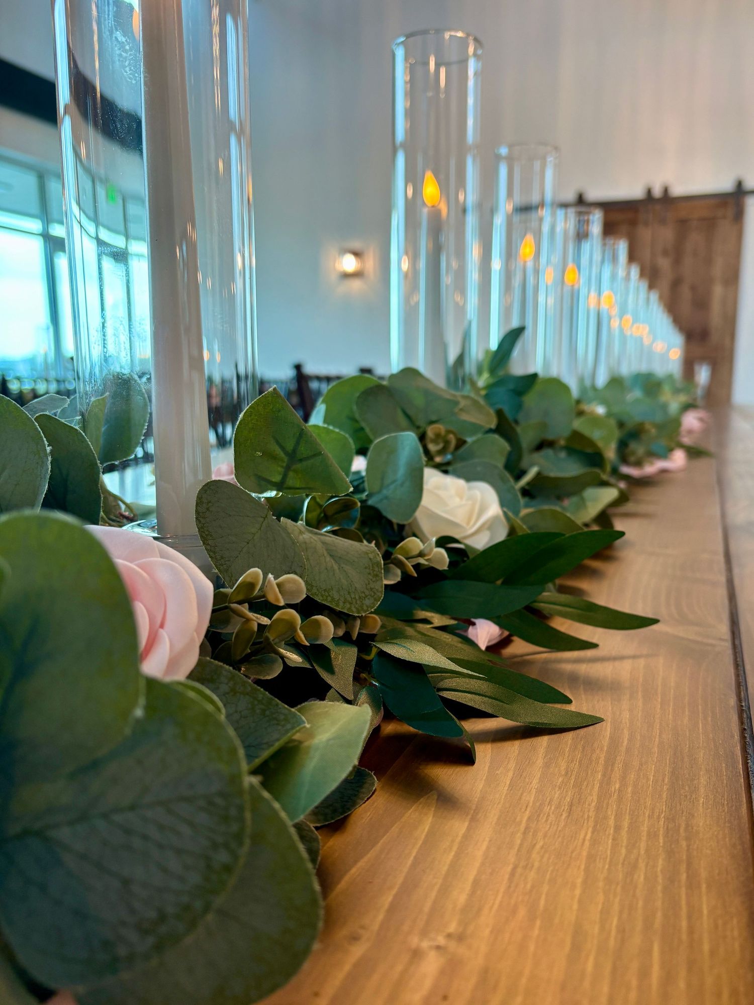 image of the event hall at The Southern Chateau Wedding Venue in Payson, Utah County, Utah, and its candle centerpieces