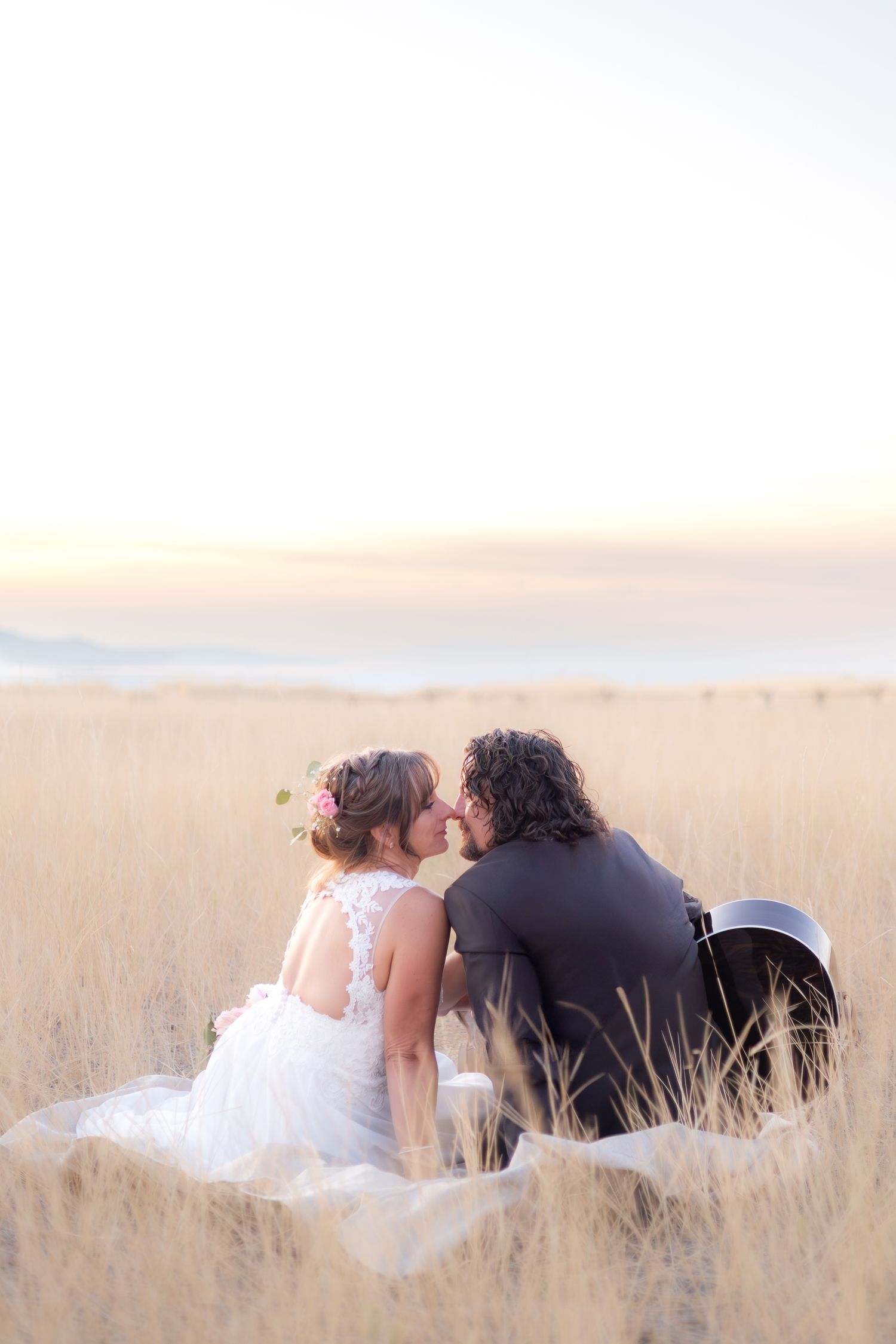 bride and groom kissing at sunset in utah bridal session wedding day sarah rogers photographer