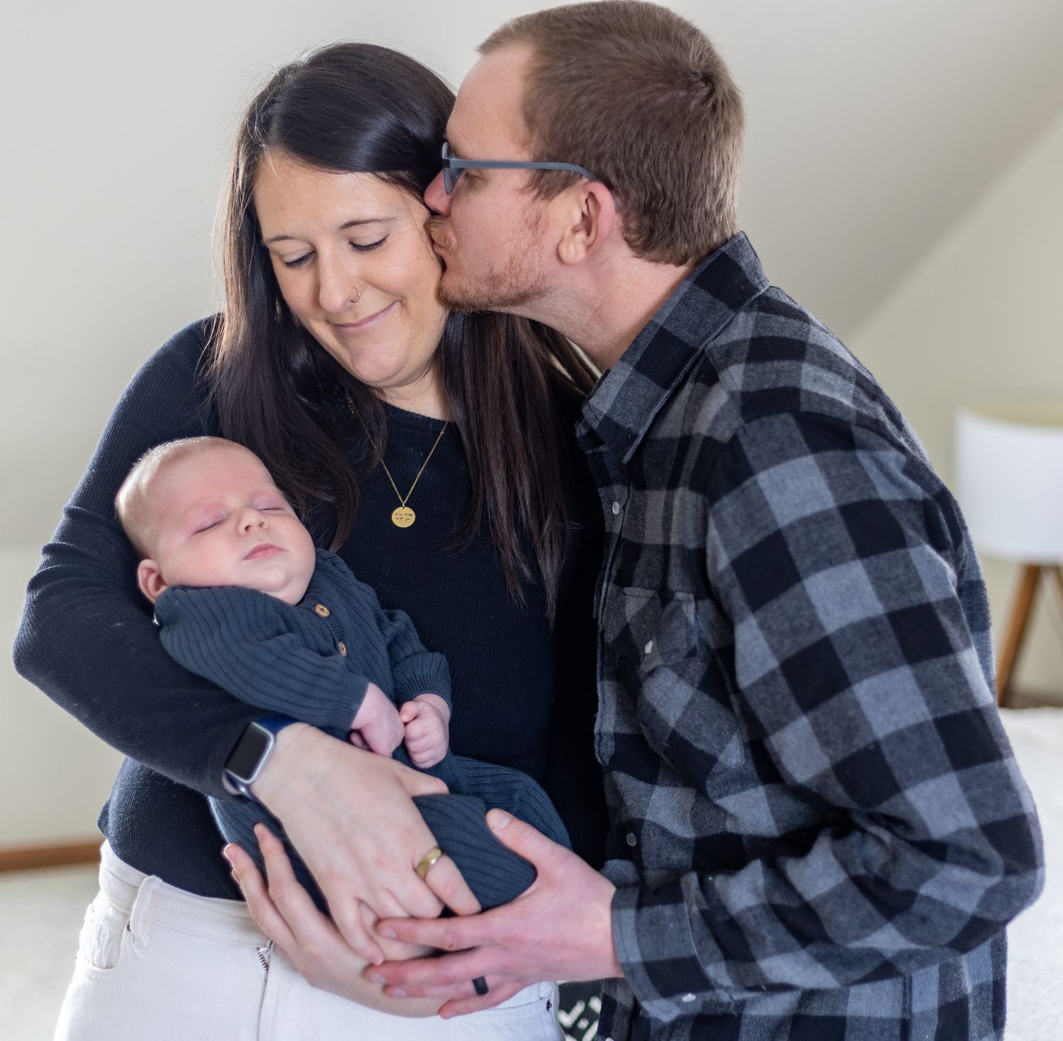 A loving couple shares tender moments with their newborn baby.Cincinnati/ Northern Kentucky