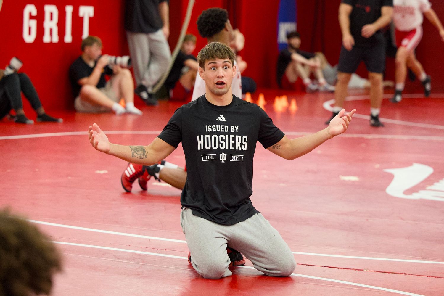 An Indiana University Bloomington wrestler confused during a conditioning practice.