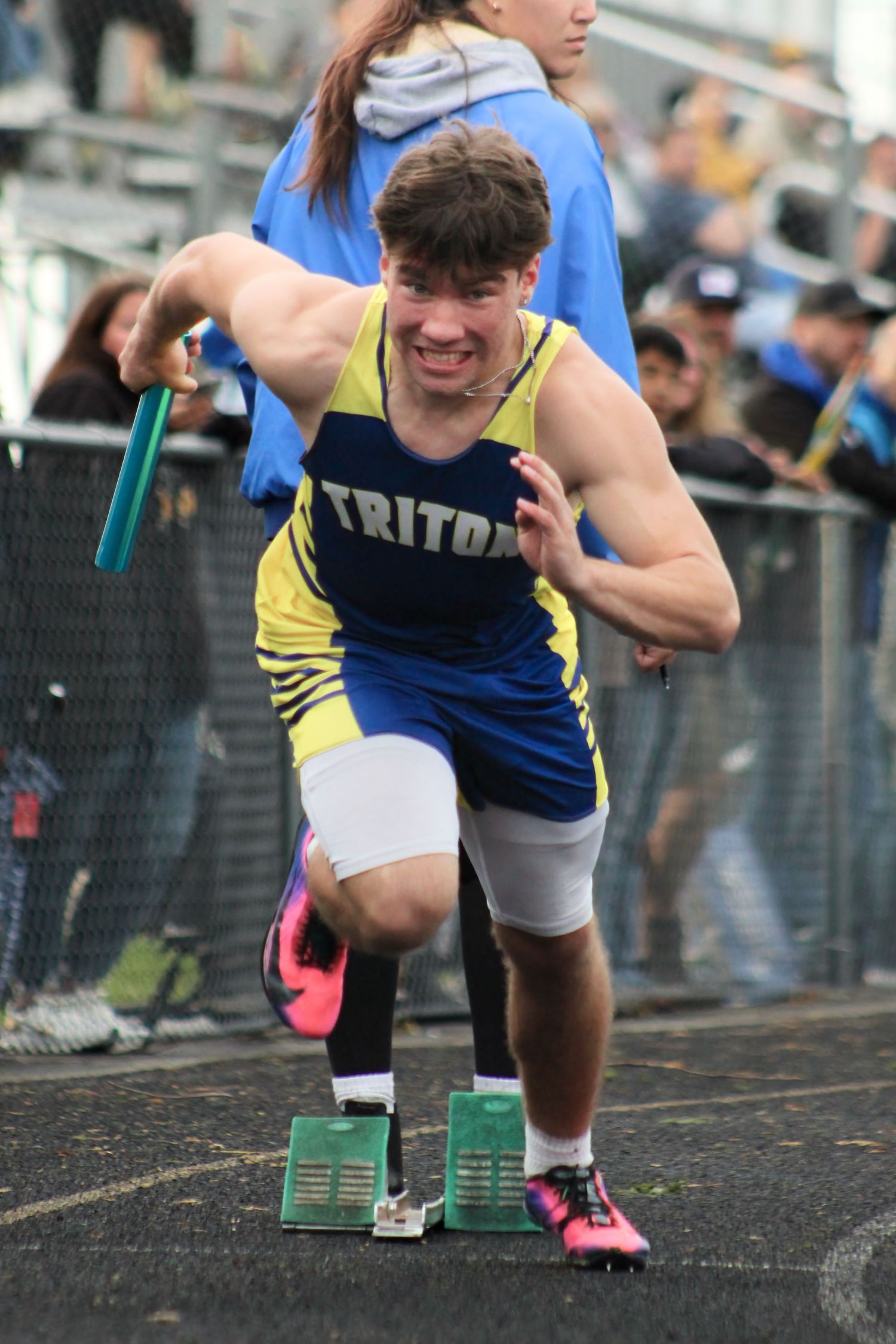 Triton H.S. (Bourbon) Varsity Track Sprinter Cayden Bradley participating in the 4x100m at the 2026 Warrior Relays.