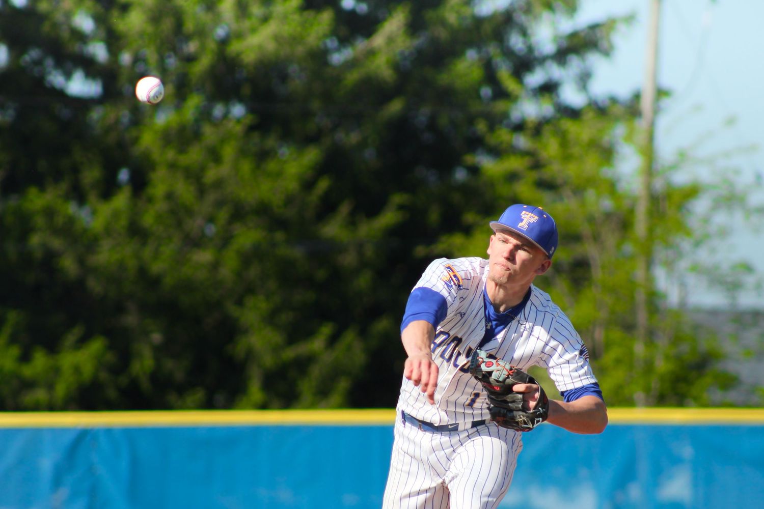 Triton H.S. (Bourbon) Varsity Baseball Player Drew Bingamon pitching during a home game.