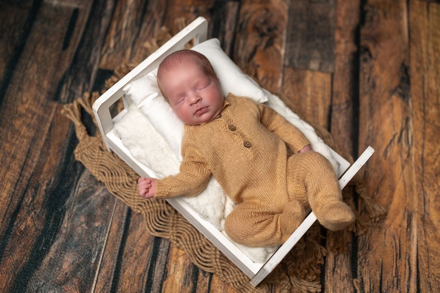 A rustic wooden background with brown tones and natural wood grain patterns showing vertical planks and textures.