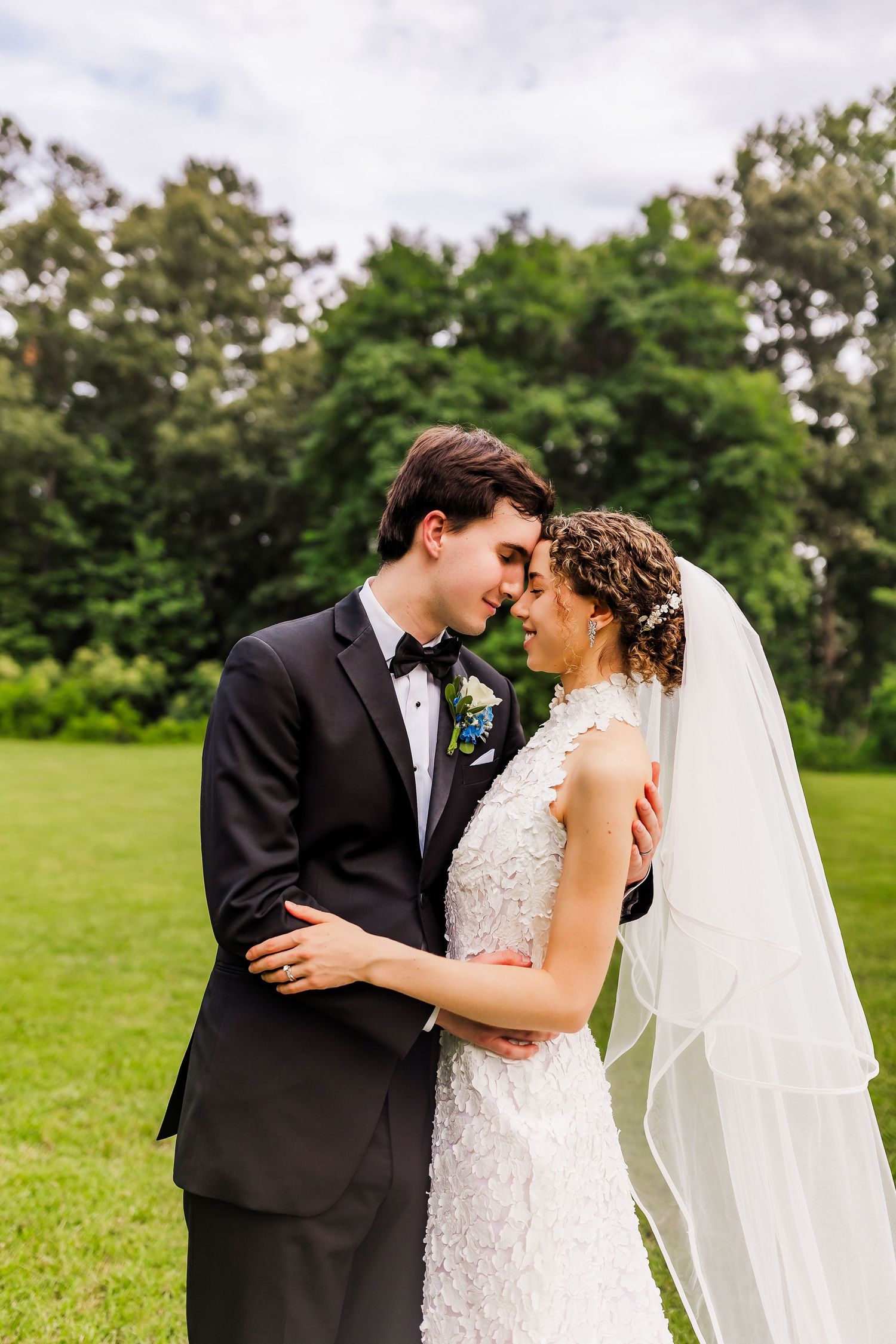 Newlywed couple shares intimate moment in a field in Lakemont, Georgia