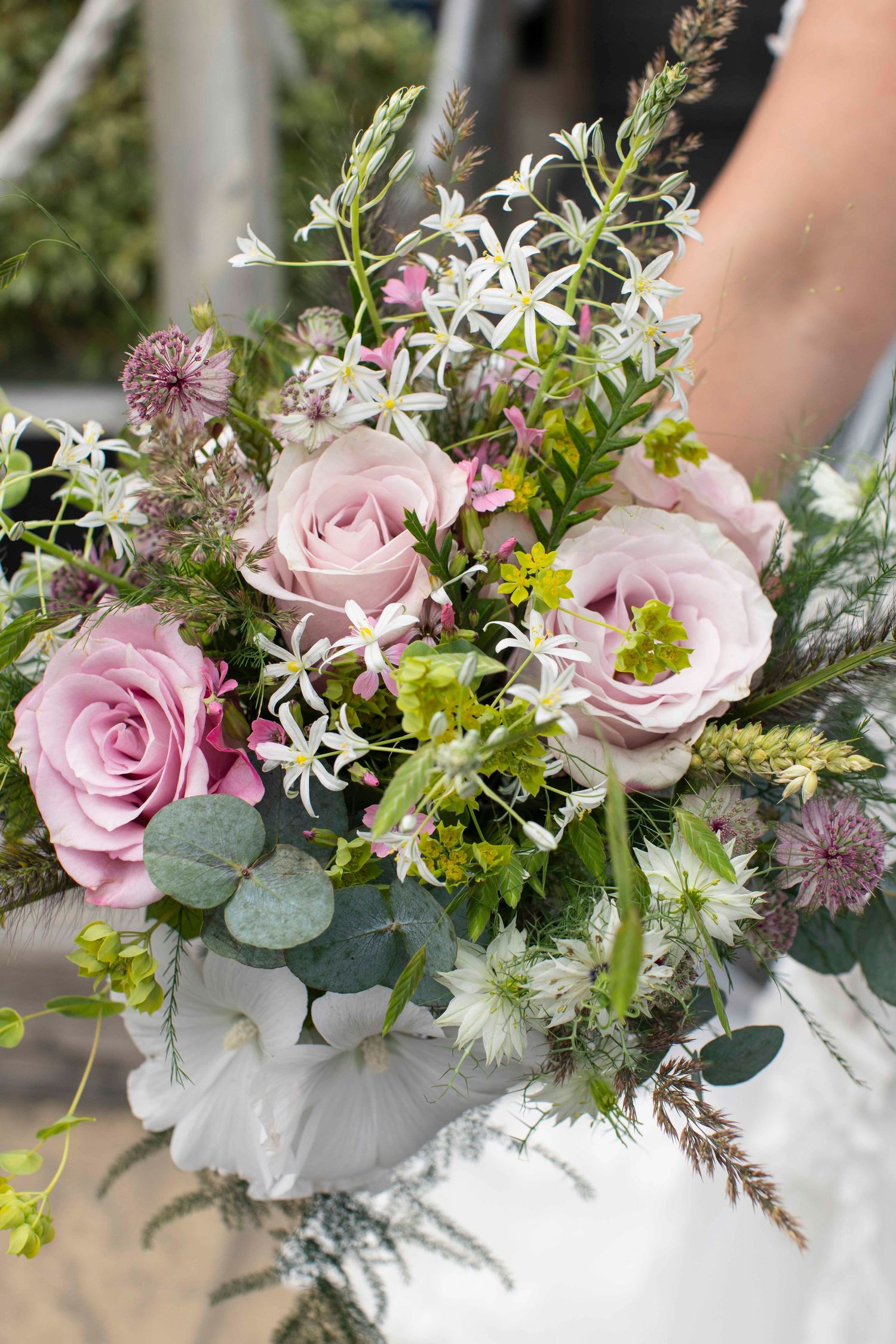 Brides bouquet, natural will flowers with coloured of dust pink and greens
