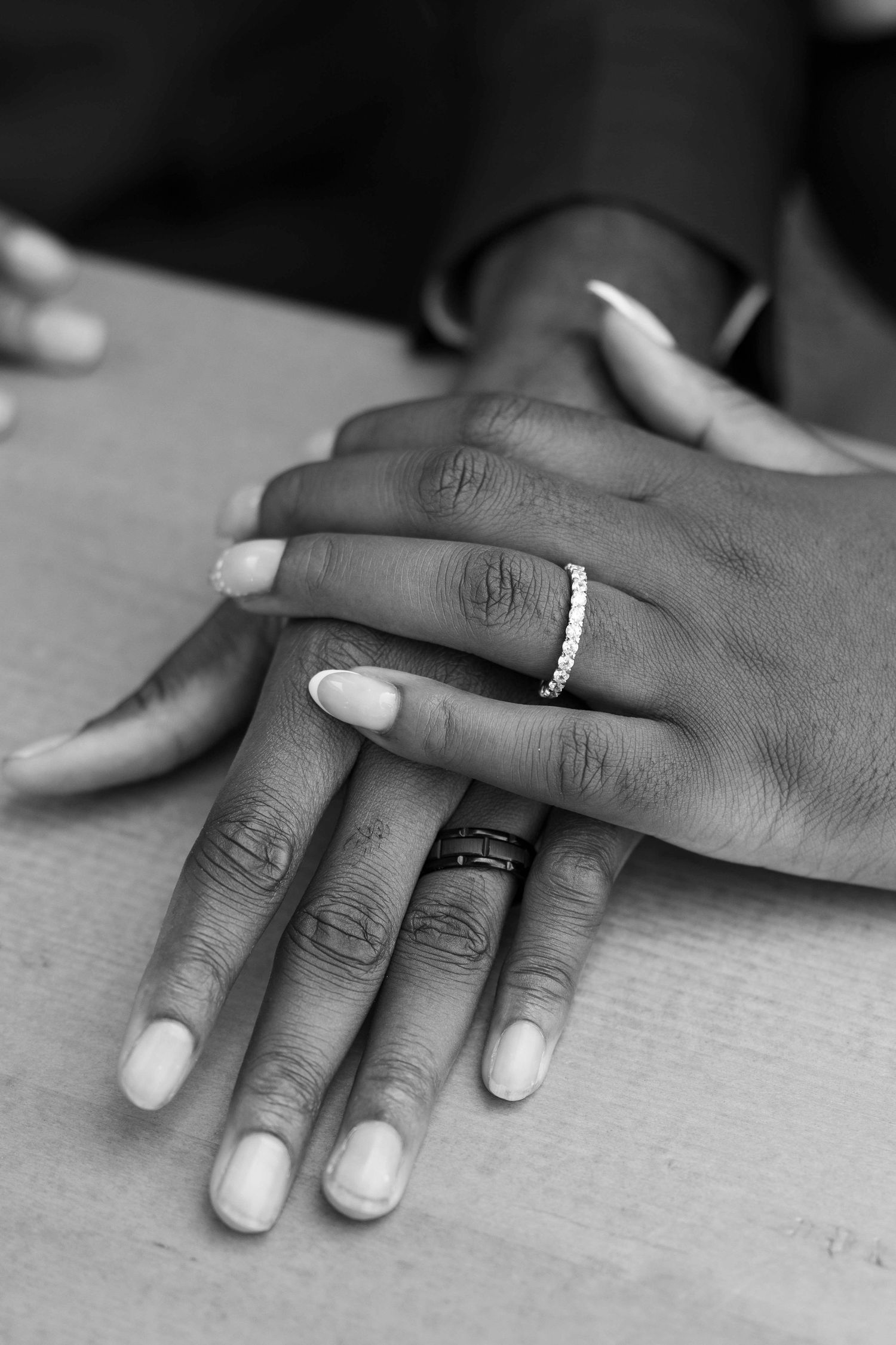 Bride and groom with thrift rings on show