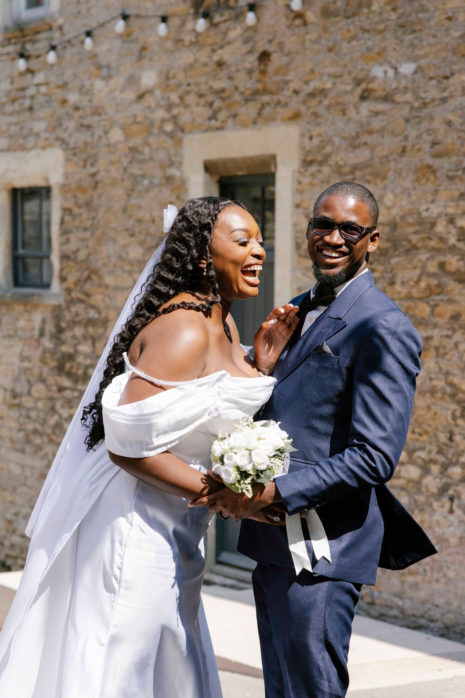 Bride and Groom laughing after they just married in Silk mill Studio, From