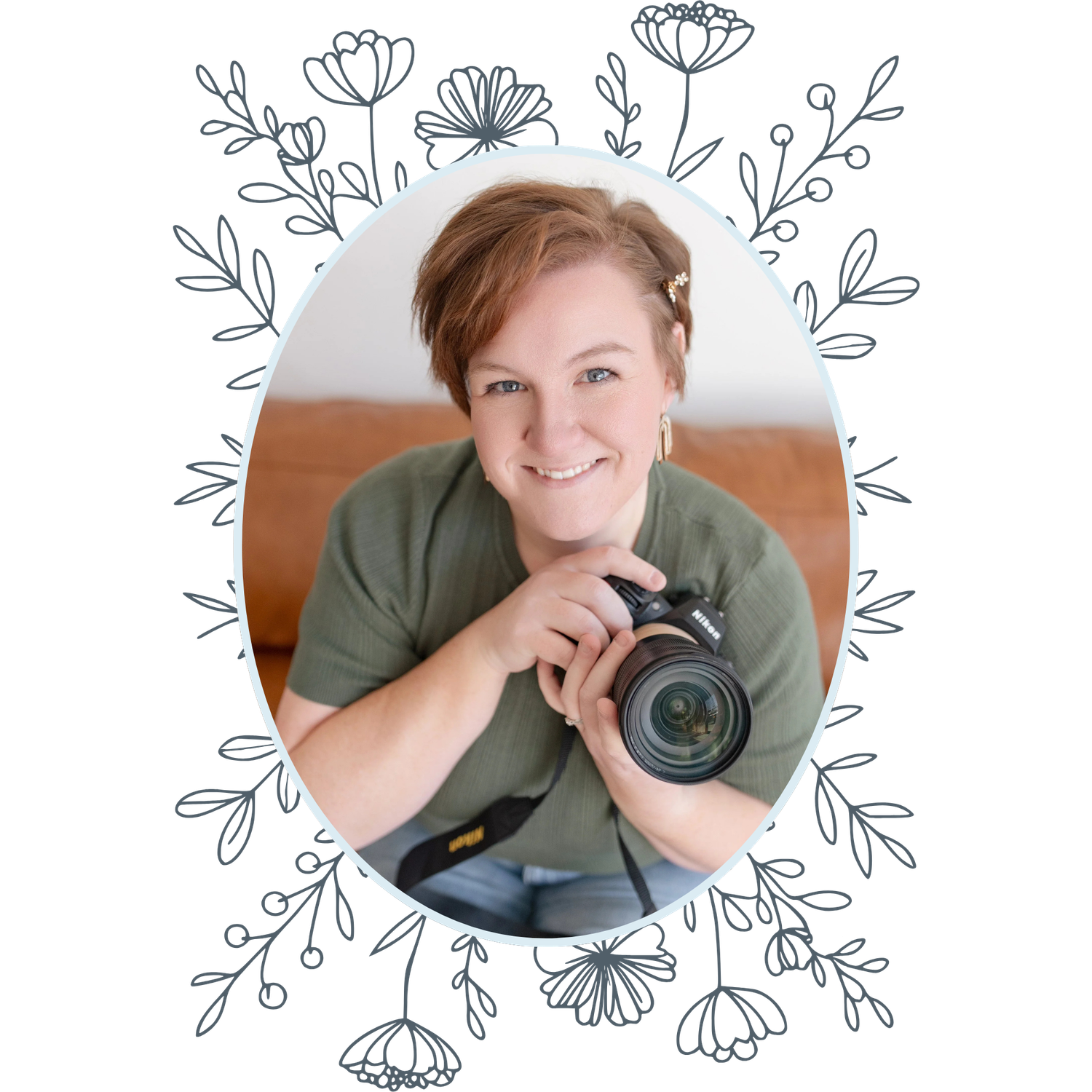 Female photographer smiling and holding a camera, framed by delicate floral line art border.