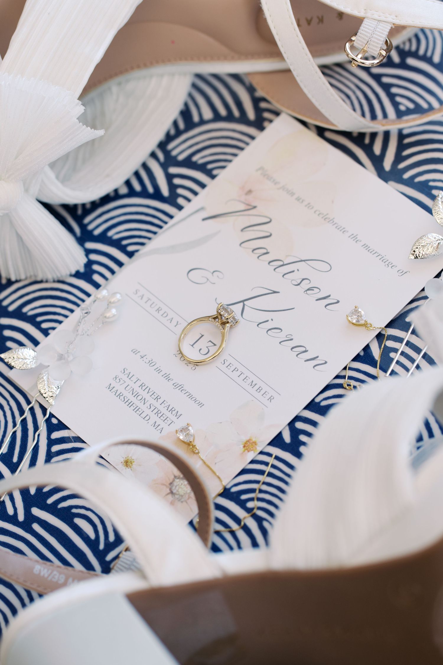 Wedding invitation suite for Madison and Kieran featuring a blue wave pattern for their Salt River Farm wedding in Marshfield, MA.