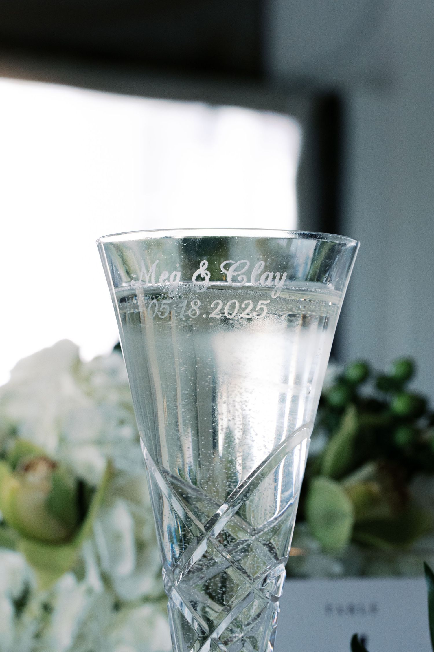 Custom etched wedding glassware for Meg and Clay overlooking the Sakonnet River at a coastal Rhode Island wedding.