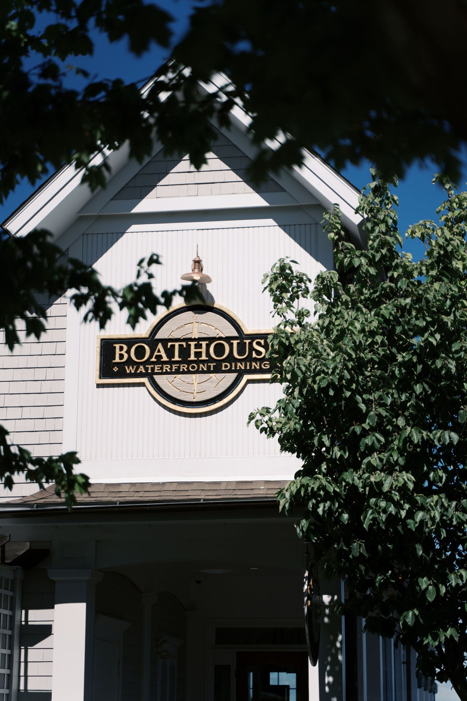 The Boathouse Waterfront Dining exterior signage and architecture in Tiverton Rhode Island.