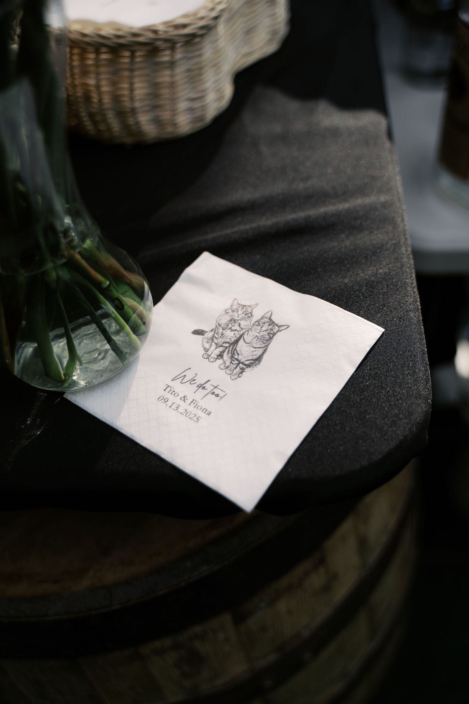 Custom illustrated wedding cocktail napkin featuring the couple's cats for a personalized Salt River Farm celebration.