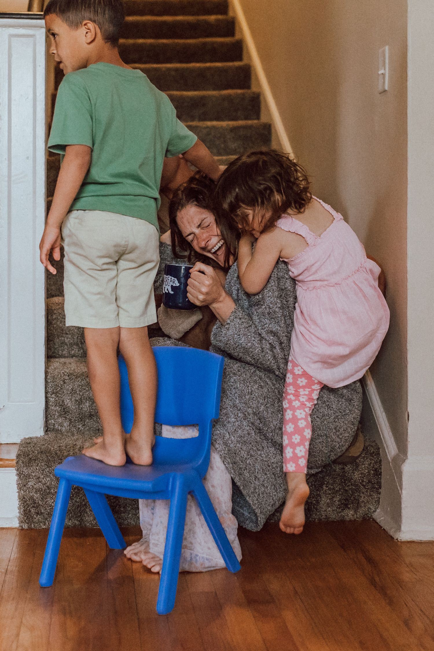Fort Sill, Oklahoma Documentary family photographer Liz Perez in the frame with kids by interval timer on the DSLR and just outside the door