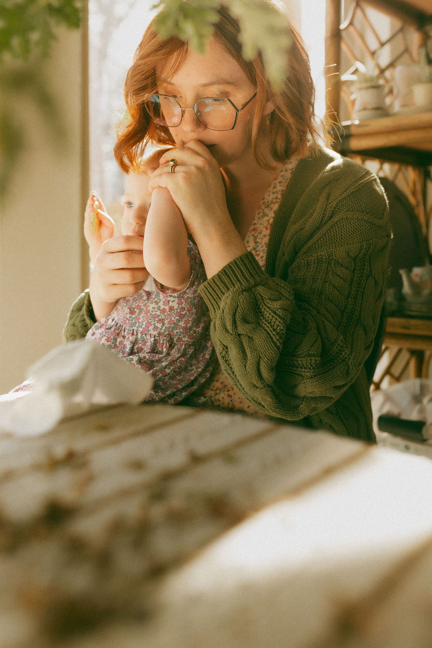 A series of warm-toned photographs showing someone drinking from a cup in a cozy interior setting.