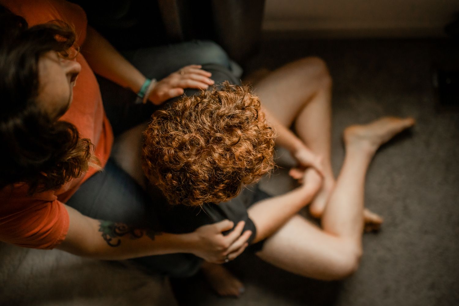 Candid photography showing people in natural indoor lighting.